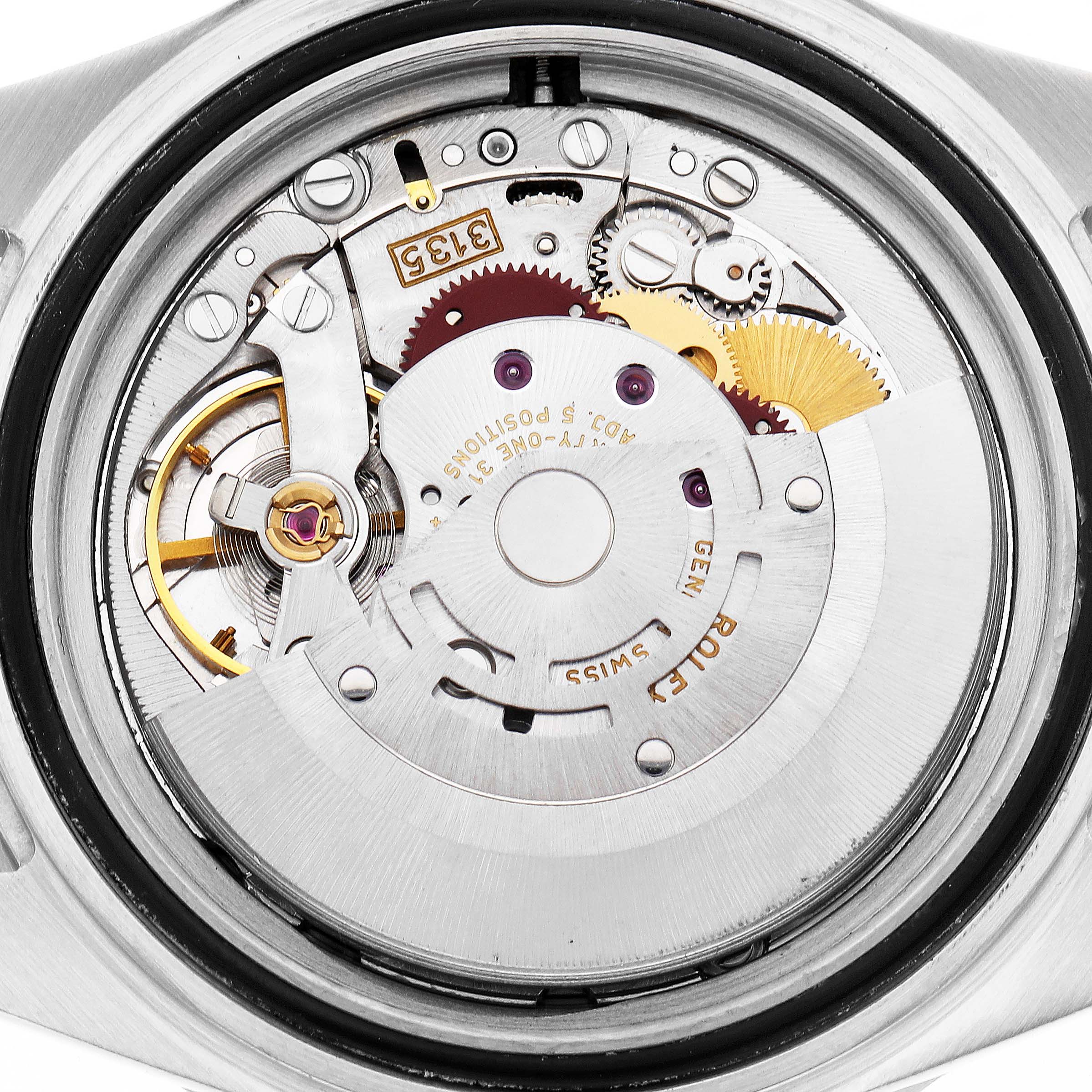 The image shows the internal movement of a Rolex Submariner model 16610, highlighting the intricate gears and mechanical components from a top-down angle.