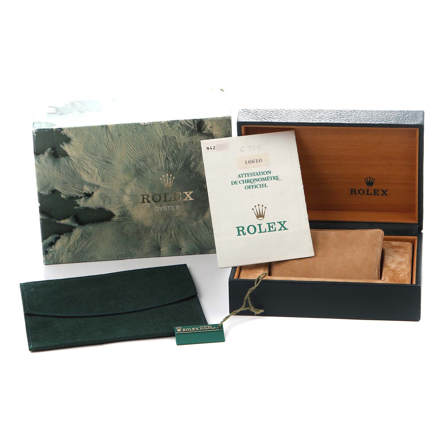 The image shows a Rolex Submariner model 16610 watch set, including the box, warranty card, and accessories, without the watch itself.