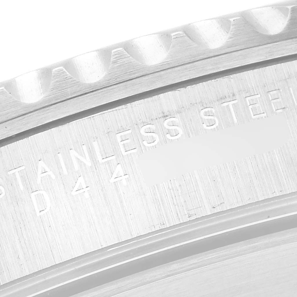 This close-up image shows the engraved details on the stainless steel back of a Rolex Submariner 14060 Men
s Stainless Steel Black Dial 14060 Men
s Stainless Steel Black Dial watch.
