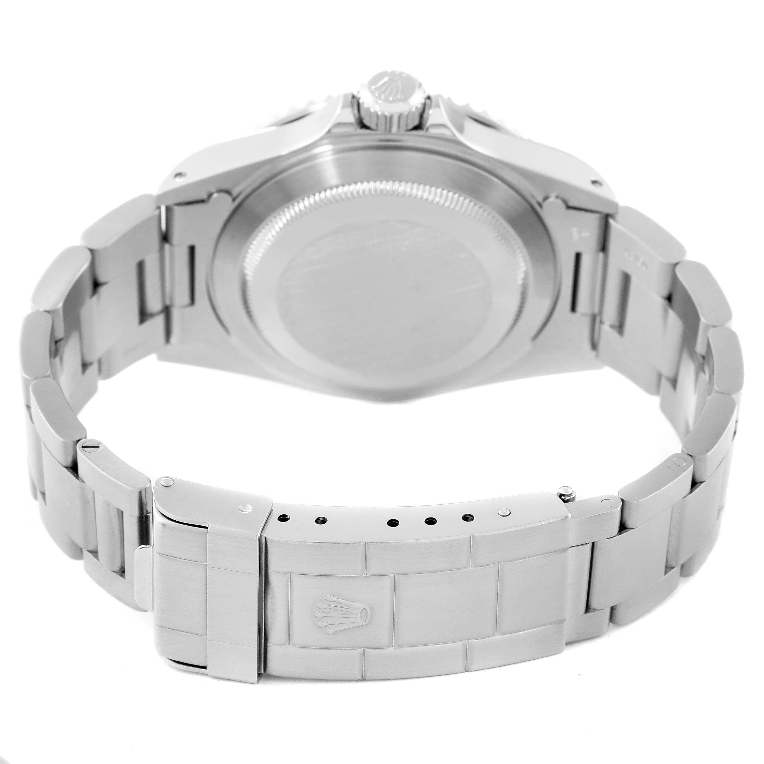 The image shows the stainless steel back and bracelet clasp of a Rolex Submariner 14060 Men
s Stainless Steel Black Dial 14060 Men
s Stainless Steel Black Dial watch from a rear angle.