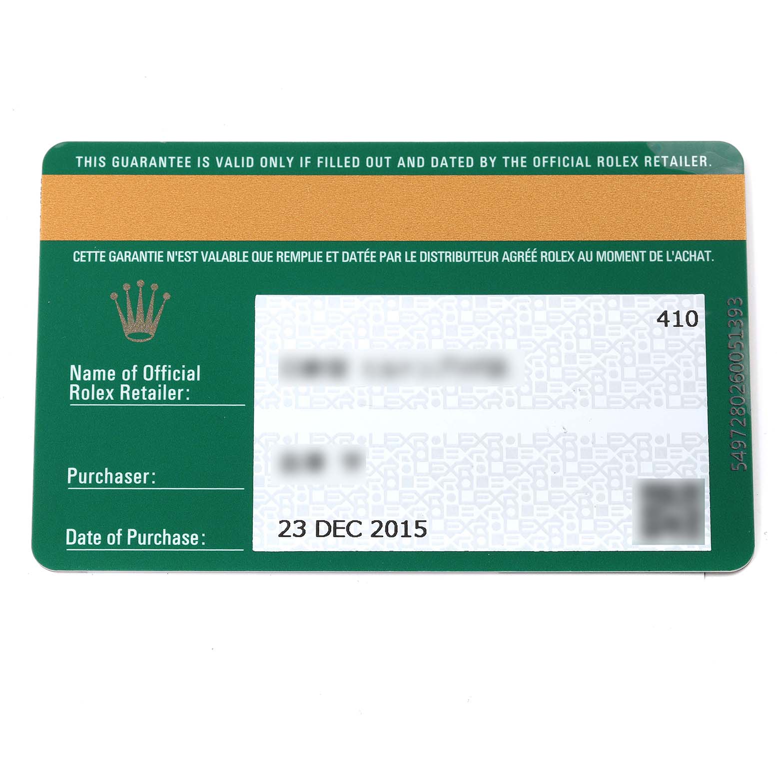 This image shows a Rolex guarantee card for the Submariner model, showcasing purchase and retailer details from a top-down angle.