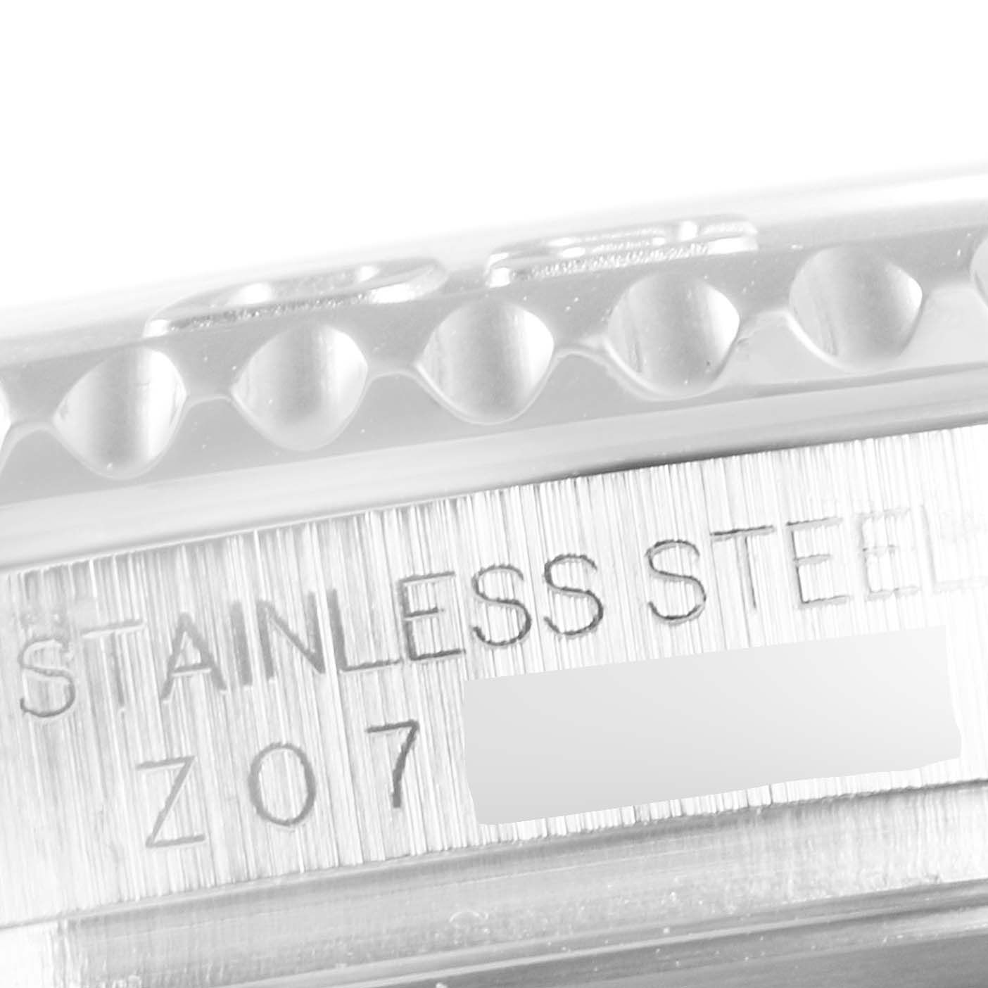 This image shows a close-up of the side view of a Rolex Yacht-Master 16622 Men
s Stainless Steel Silver Dial 16622 Men
s Stainless Steel Silver Dial, highlighting the "STAINLESS STEEL" inscription.