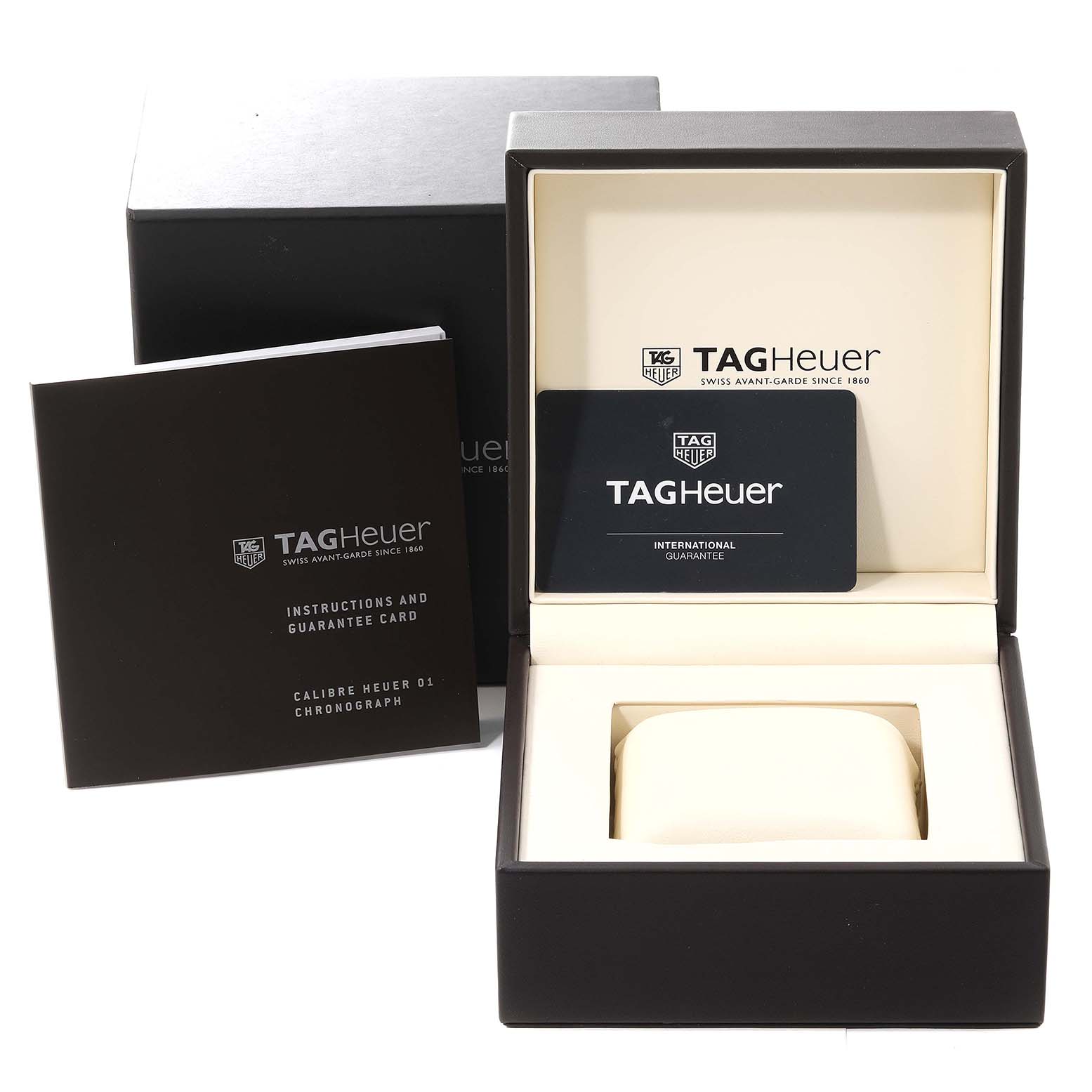 The image shows the Tag Heuer Carrera CAR2A90.FT6071 Men's Ceramic Black Dial CAR2A90.FT6071 Men's Ceramic Black Dial watch's packaging, including a box, instruction manual, and guarantee card.