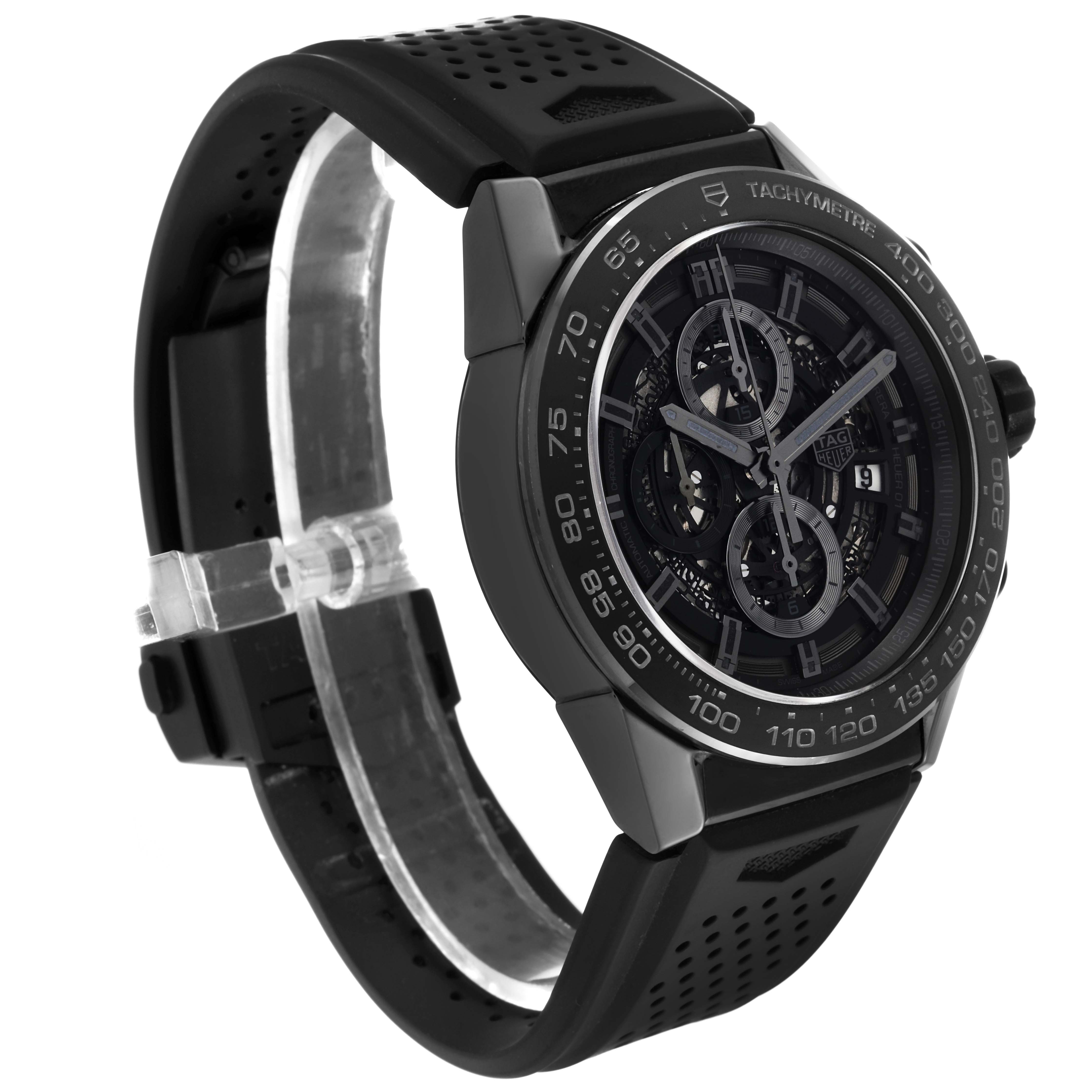 The Tag Heuer Carrera CAR2A90.FT6071 Men's Ceramic Black Dial CAR2A90.FT6071 Men's Ceramic Black Dial watch is shown at a three-quarter angle, displaying its face, bezel, and perforated black strap.