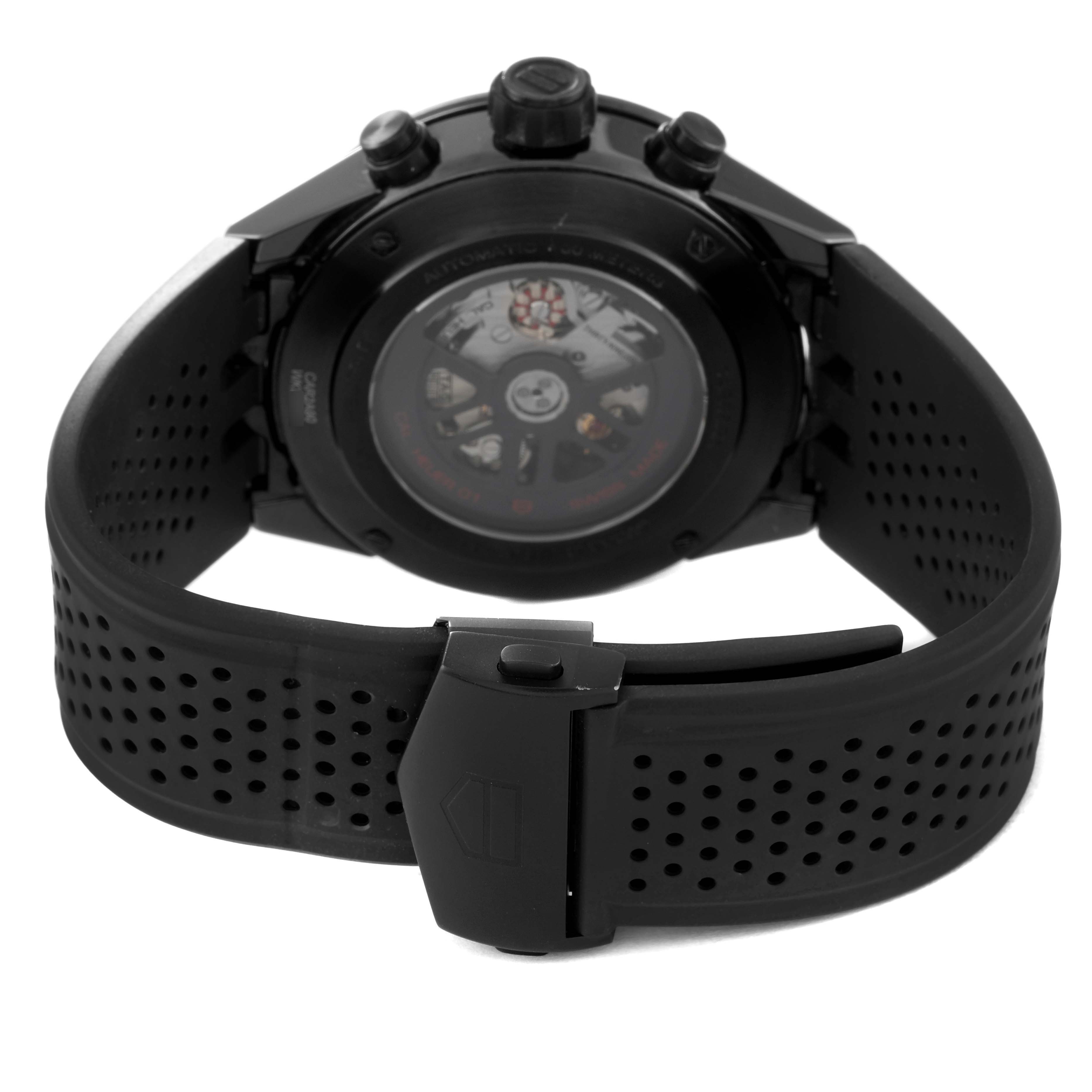 The image shows the back view of a Tag Heuer Carrera CAR2A90.FT6071 Men's Ceramic Black Dial CAR2A90.FT6071 Men's Ceramic Black Dial watch, highlighting the transparent case back and perforated strap.