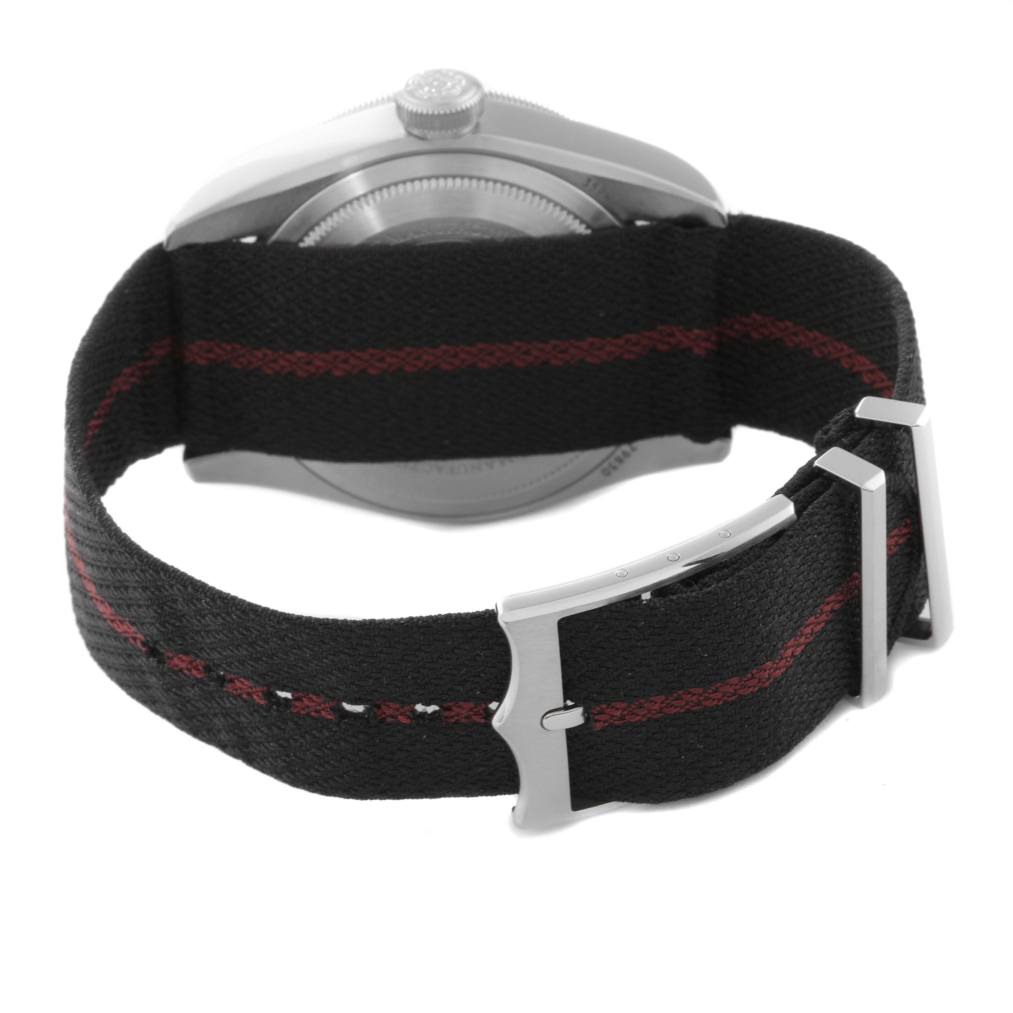 This image shows the backside of a Tudor Heritage Black Bay 79830RB Men's Stainless Steel Black Dial 79830RB Men's Stainless Steel Black Dial watch, focusing on its strap and clasp.