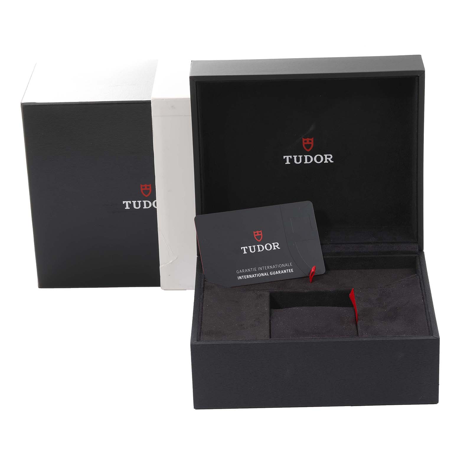 The image shows the packaging, guarantee card, and box for the Tudor Heritage Black Bay 79830RB Men's Stainless Steel Black Dial 79830RB Men's Stainless Steel Black Dial watch.