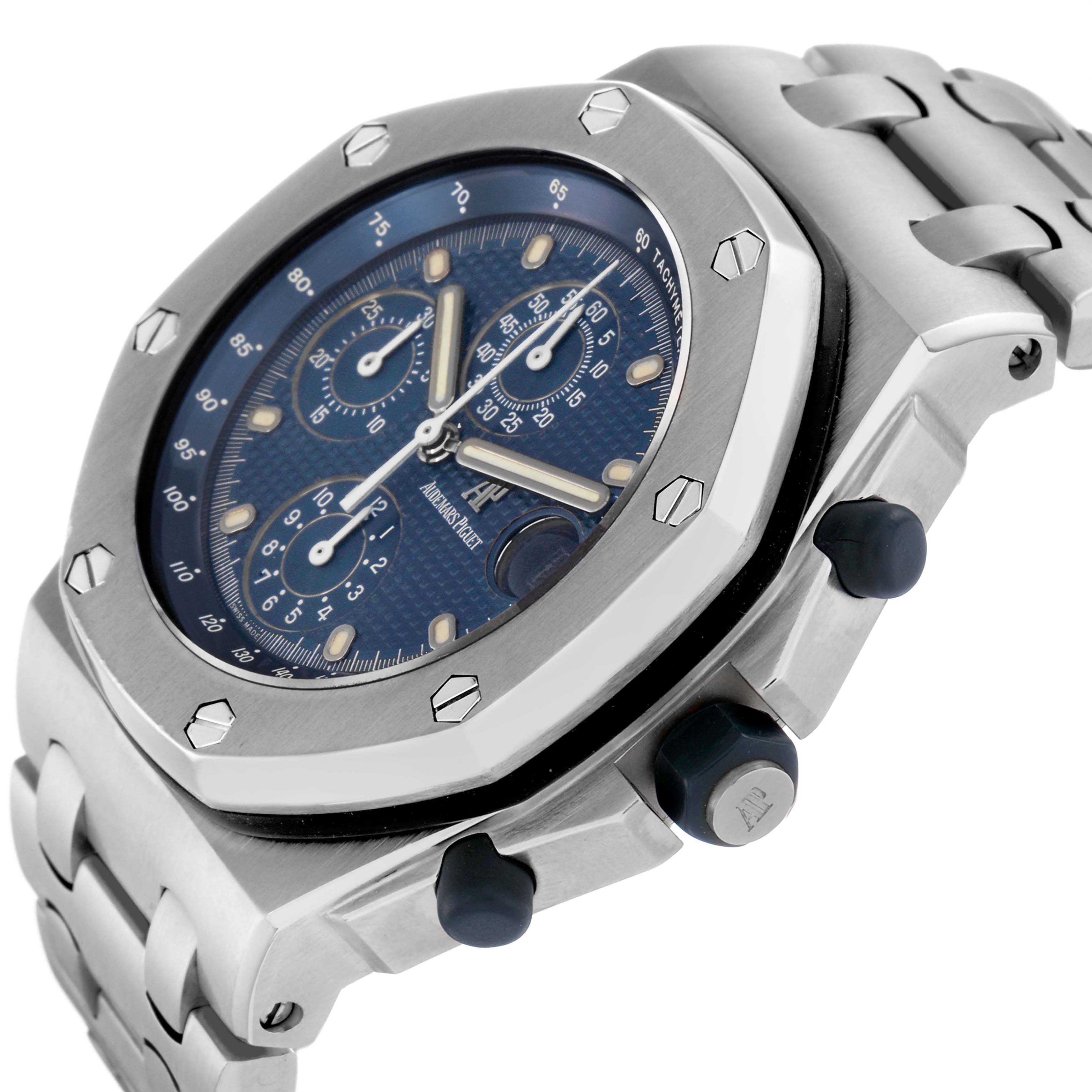 The image shows the Audemars Piguet Royal Oak Offshore, model number 25721ST, at an angled view highlighting the blue dial, bezel, and metal bracelet.
