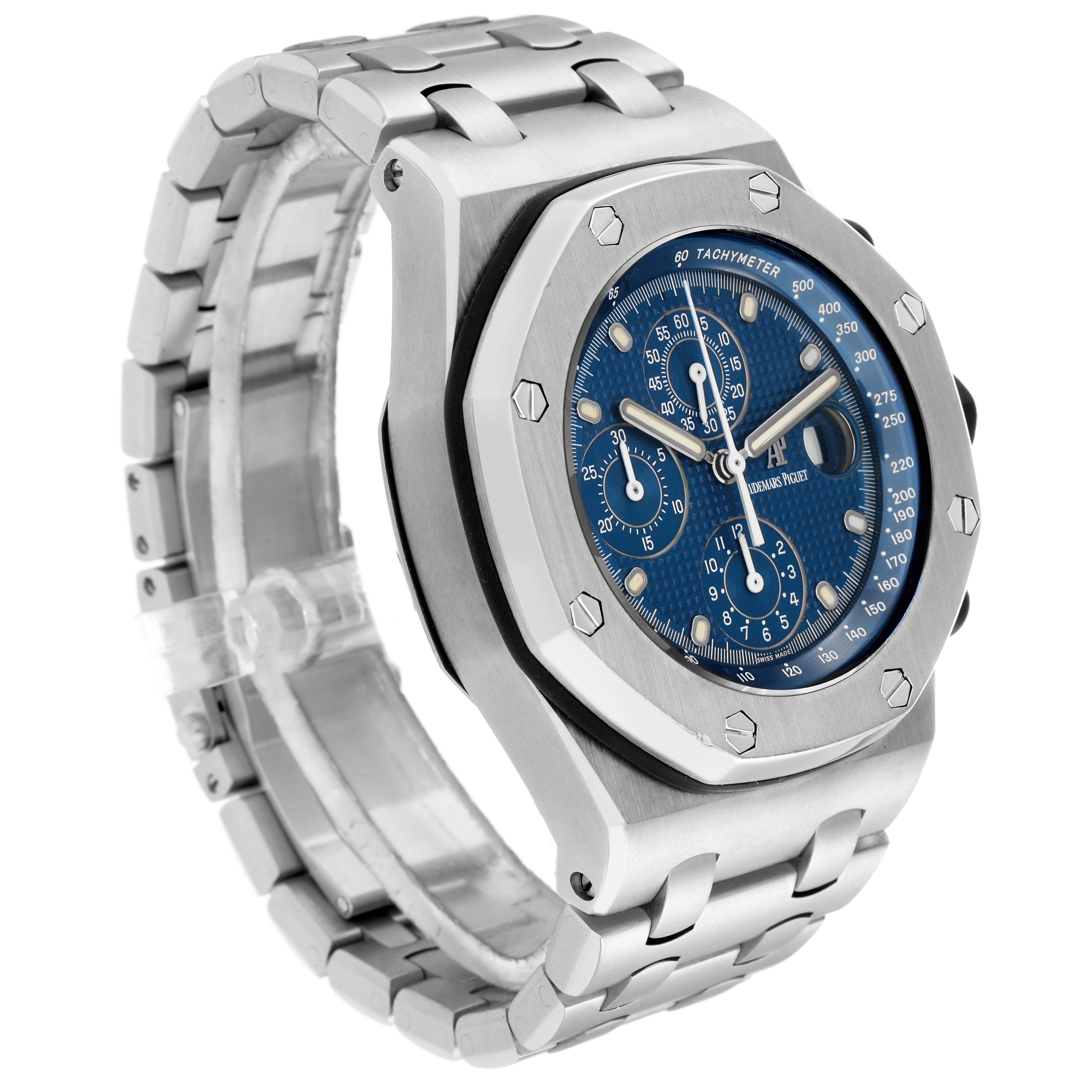 The image shows the Audemars Piguet Royal Oak Offshore model number 25721ST at a side angle, highlighting the blue dial, bezel, and stainless steel bracelet.