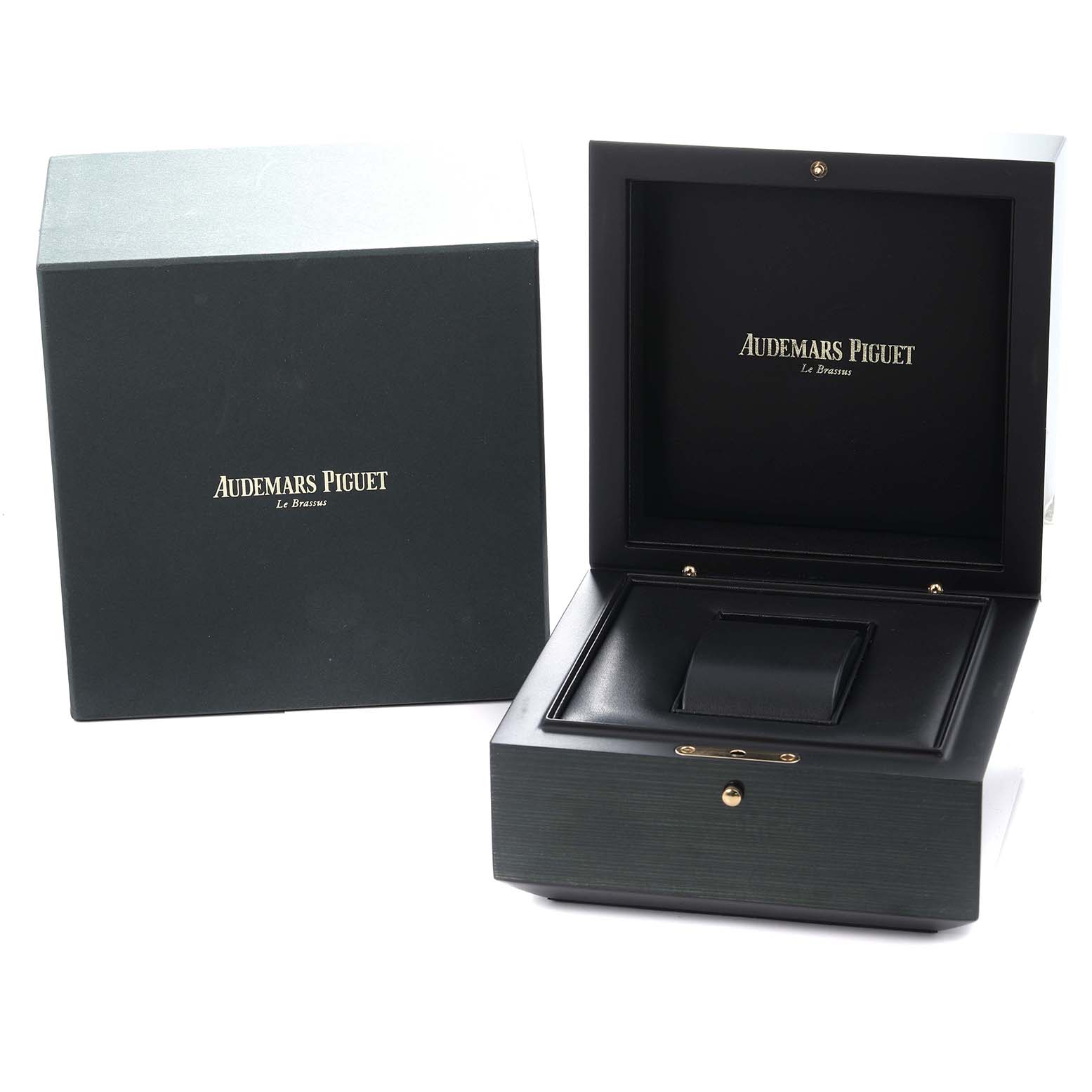 The image shows a display and storage box for an Audemars Piguet Royal Oak Offshore model 25721ST men's watch, viewed from an angle showing both the closed and open boxes.