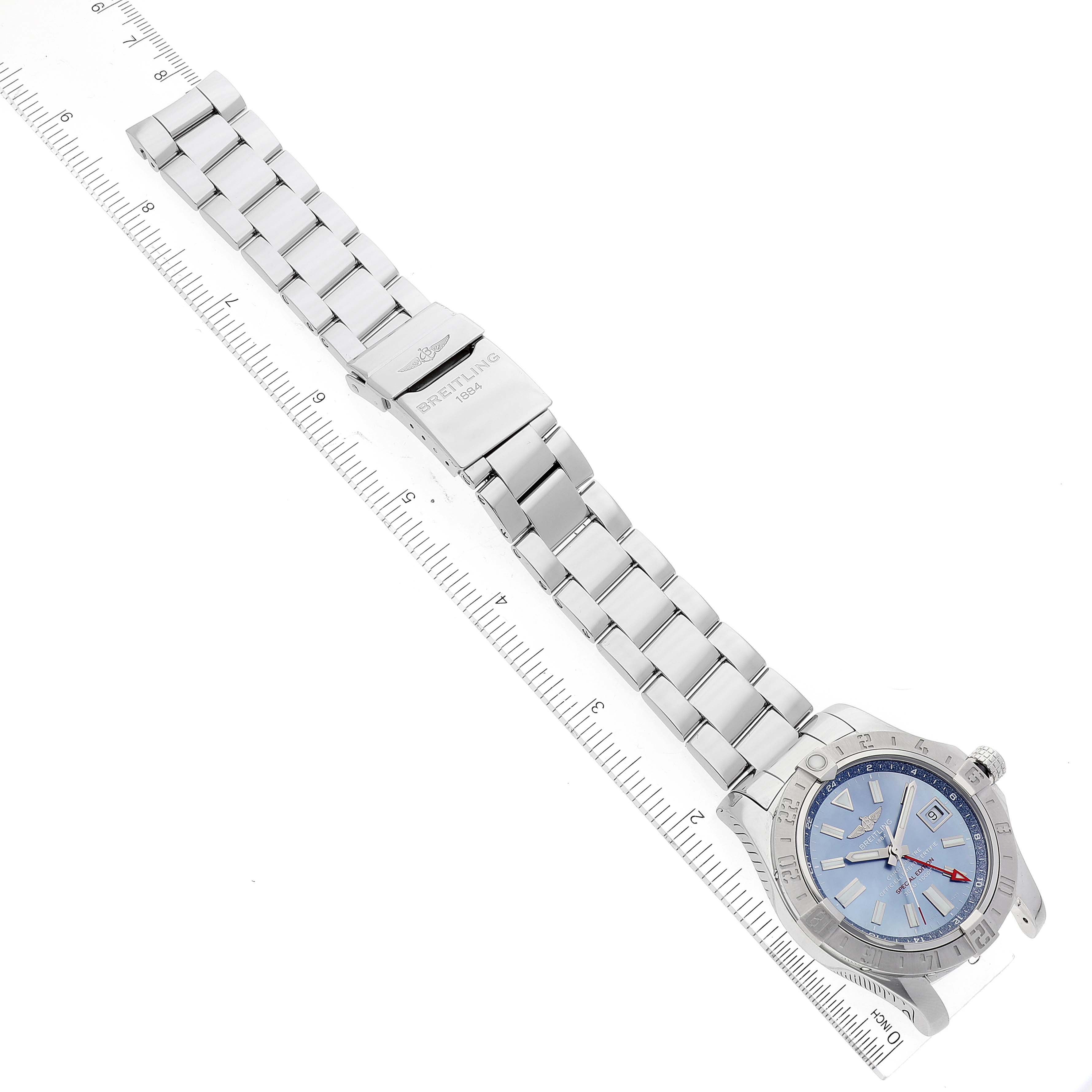 The image shows a top-down angle of a Breitling Avenger A3239011-C872-170A Men
s Stainless Steel Mother of Pearl Dial A3239011-C872-170A Men
s Stainless Steel Mother of Pearl Dial watch, displaying the bracelet and part of the case with a blue dial.