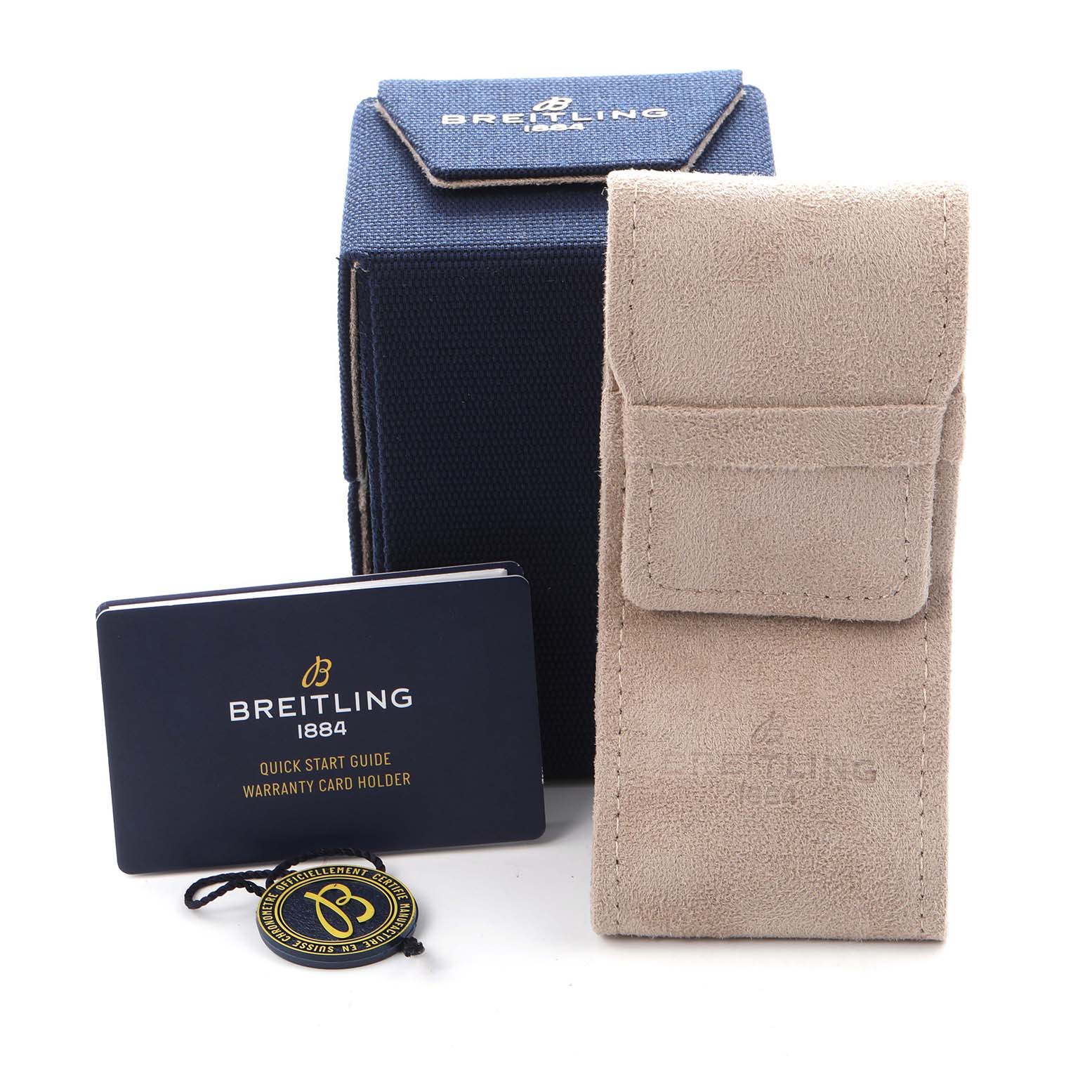 The image shows Breitling Colt model Y23380 accessories, including a blue box, a beige pouch, a quick start guide, and a warranty card holder.