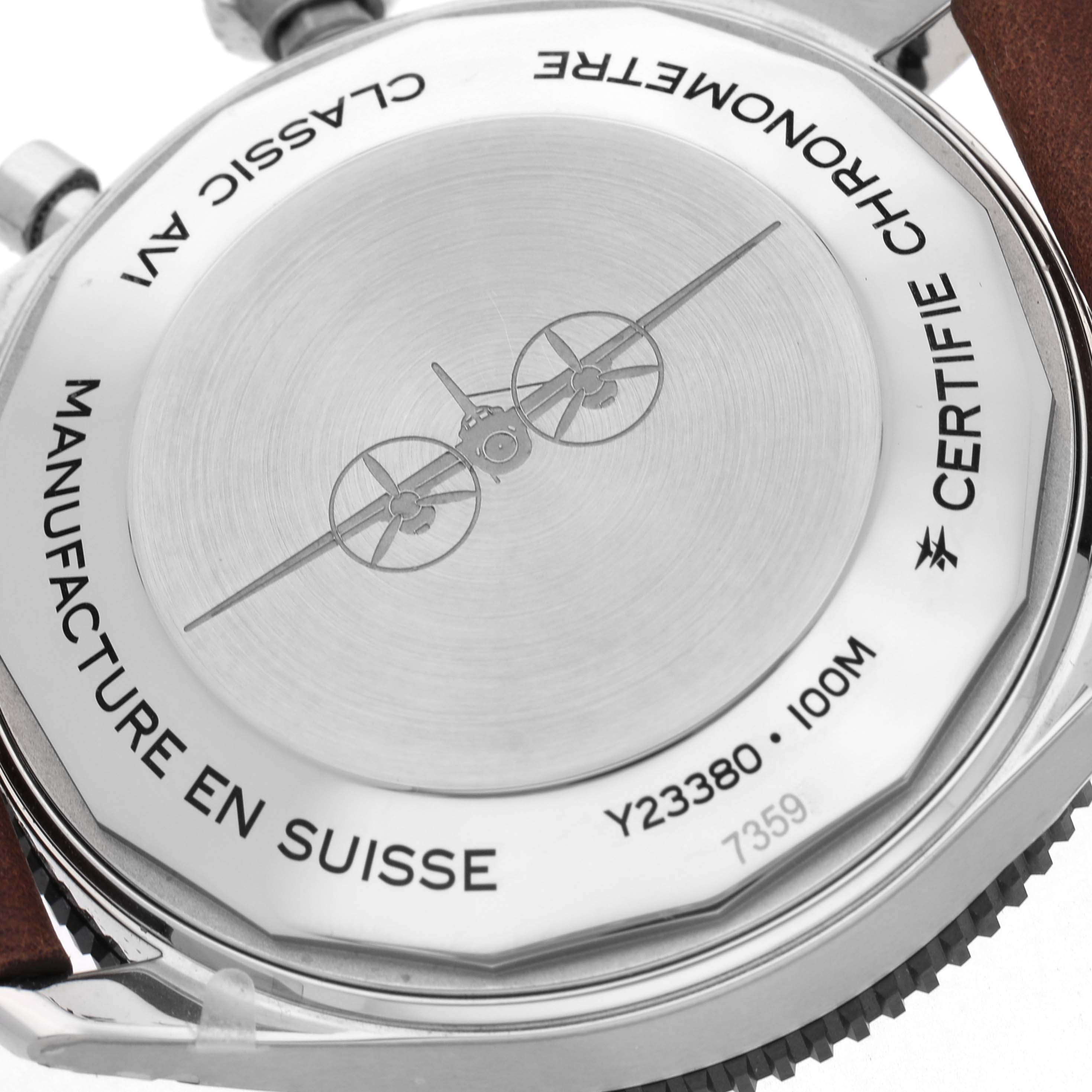 The image shows the back case of a Breitling Colt watch, model number Y23380, displaying engravings and the model specifications.