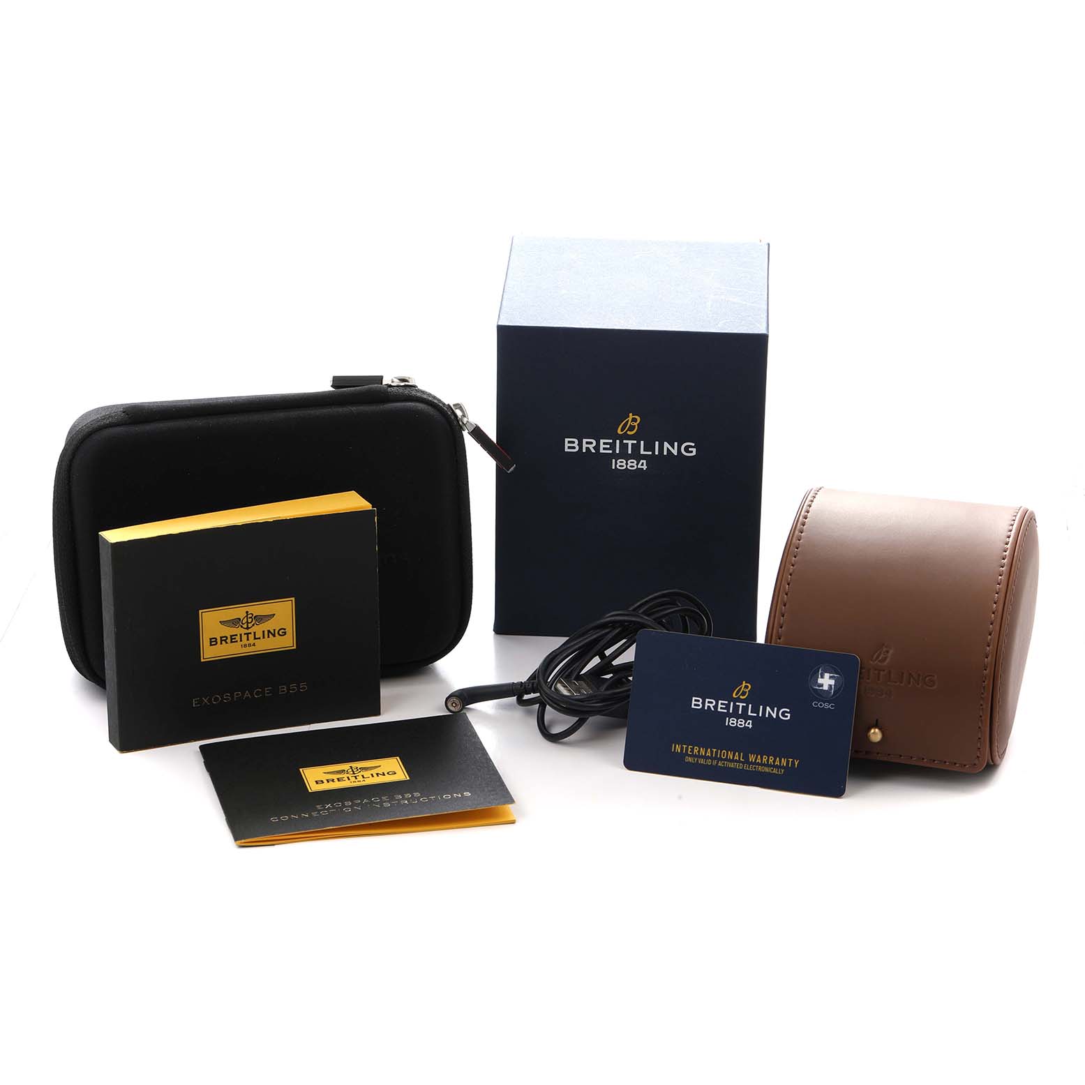 The image shows accessories for a Breitling Professional Series VB5510 men's watch, including a box, case, manuals, warranty card, and a charging cable.