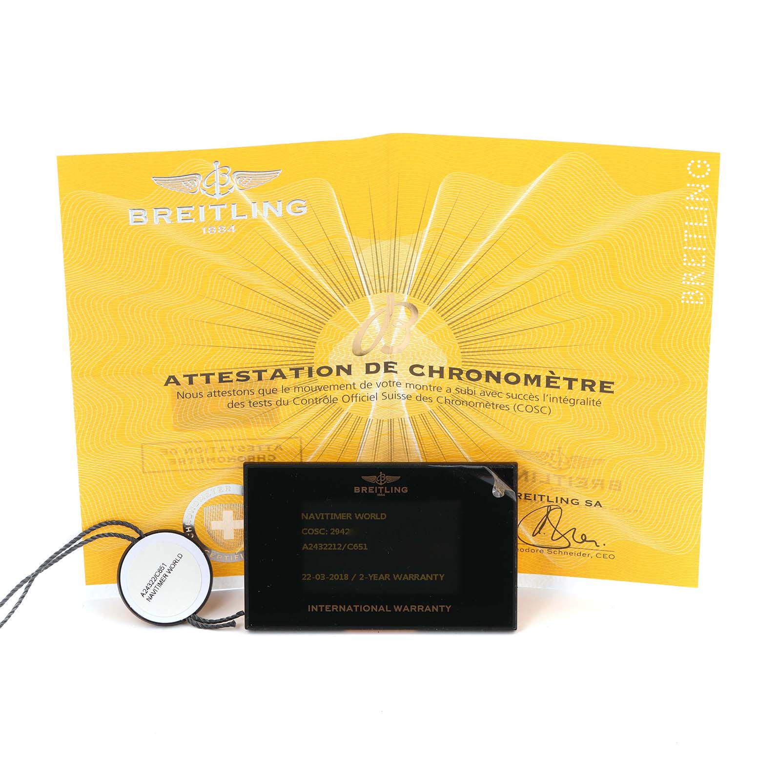 This image shows the certificate and warranty card for a Breitling Navitimer model A24322 men's watch.