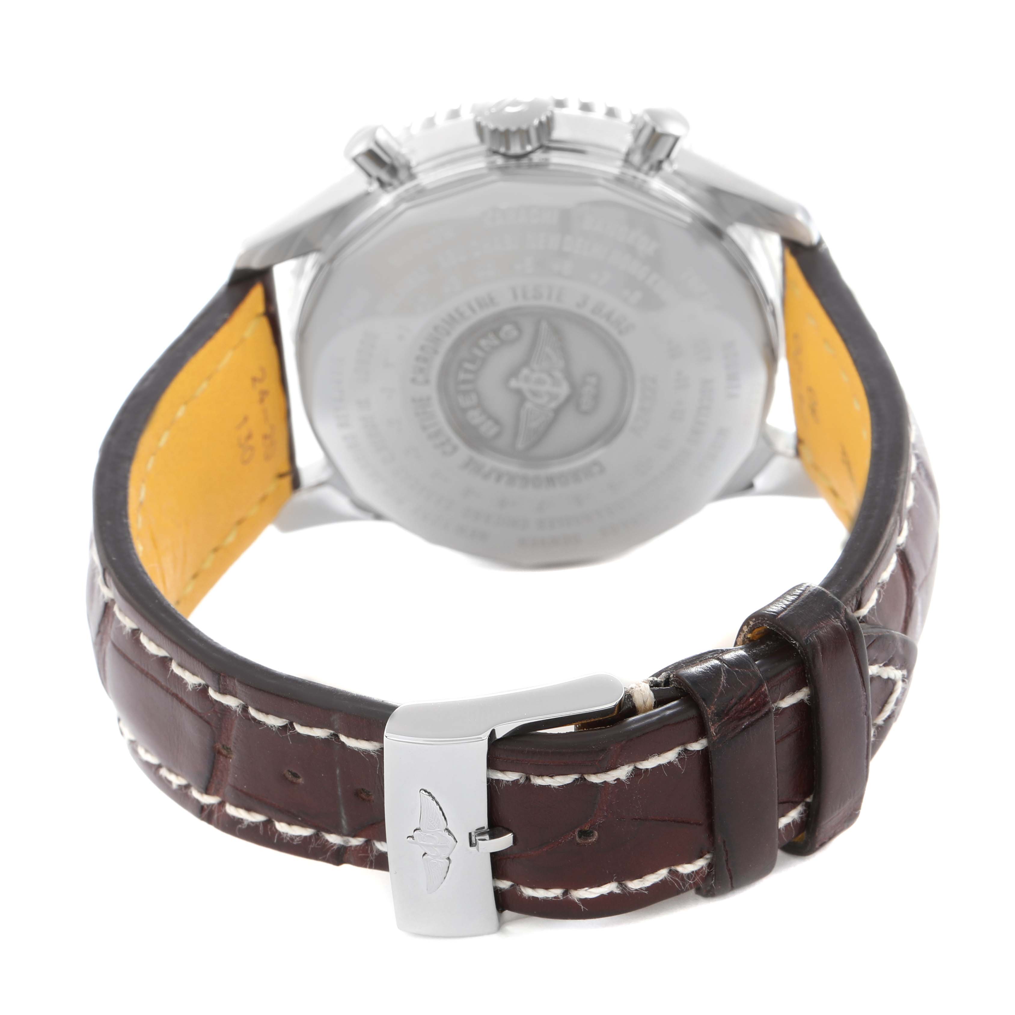 The image shows the back view of a Breitling Navitimer A24322 men's watch, highlighting its case back, leather strap, and buckle.