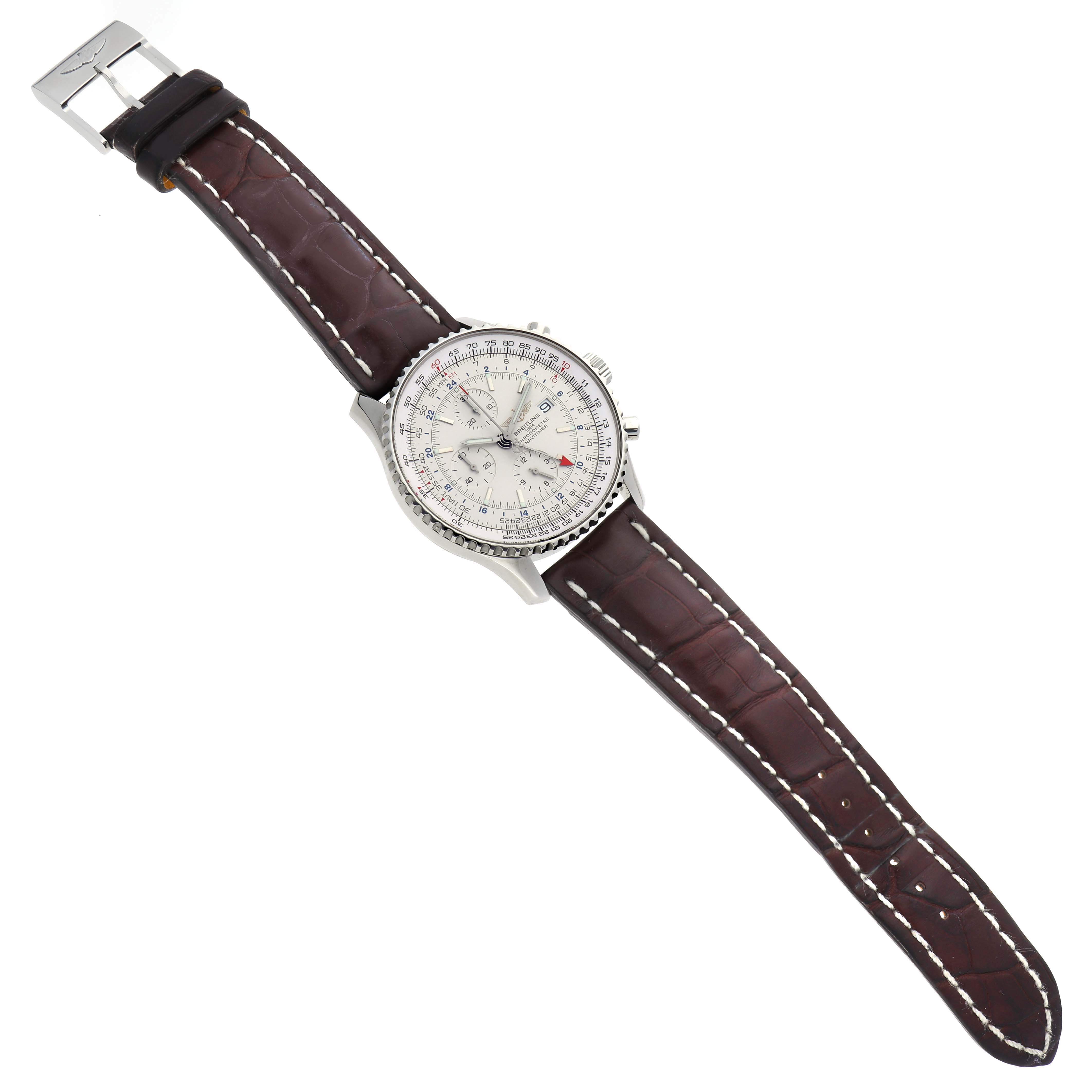 The Breitling Navitimer model A24322 is shown from a top-down angle, displaying its dial, chronograph features, and brown leather strap.