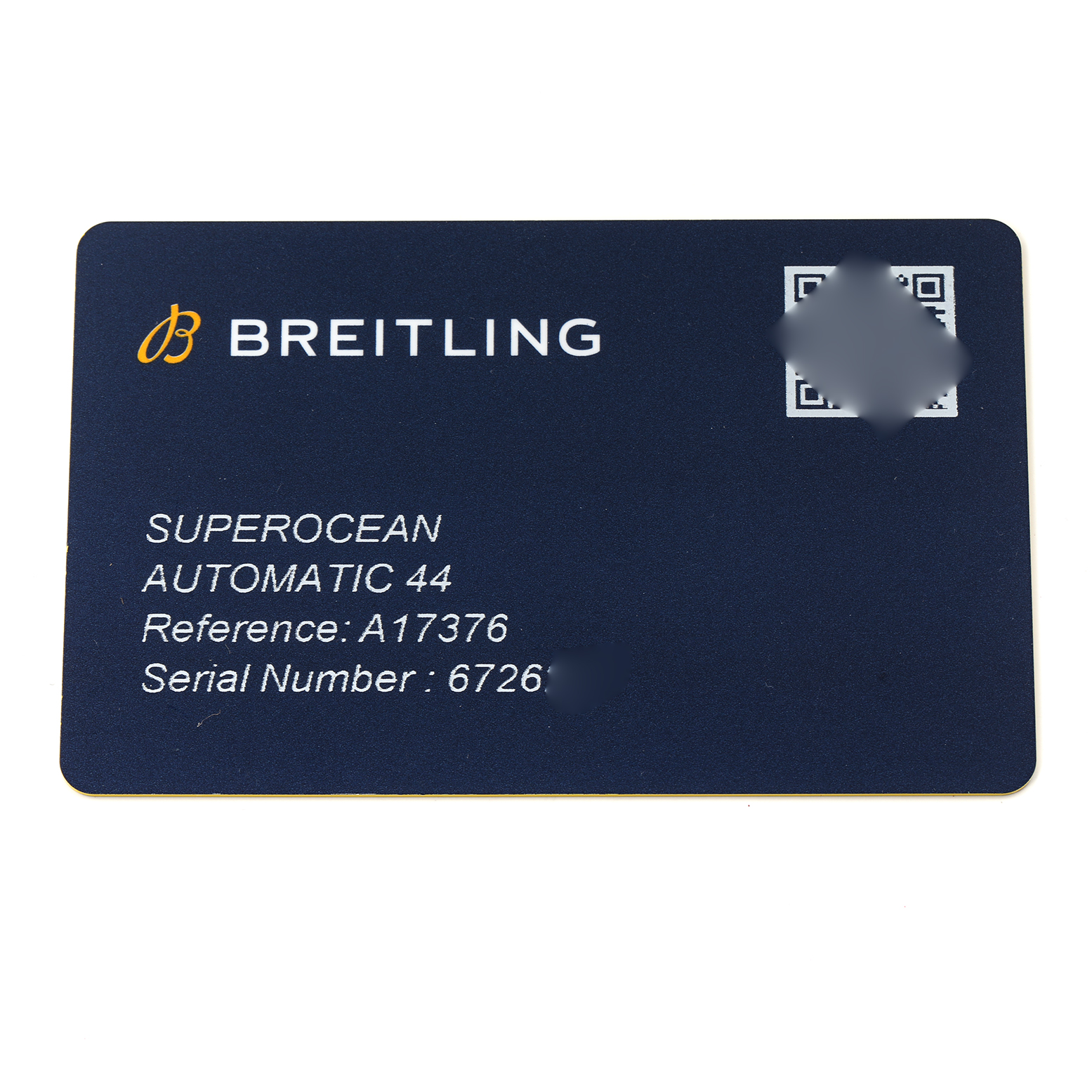The image shows a Breitling Superocean reference card with details including model A17376, serial number, and branding, viewed from a top-down angle.