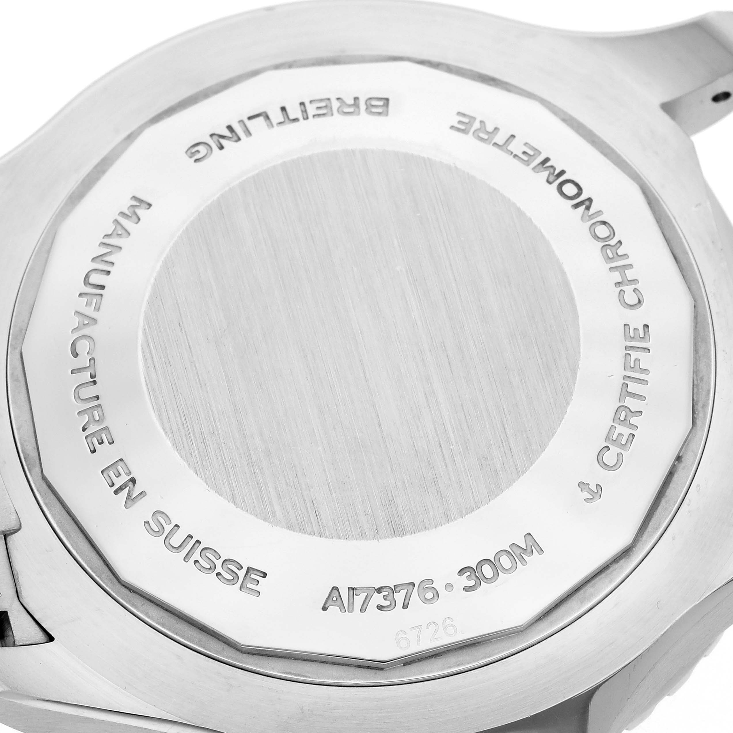 The image shows the back of a Breitling Superocean watch, model A17376, displaying the engravings and branding details.