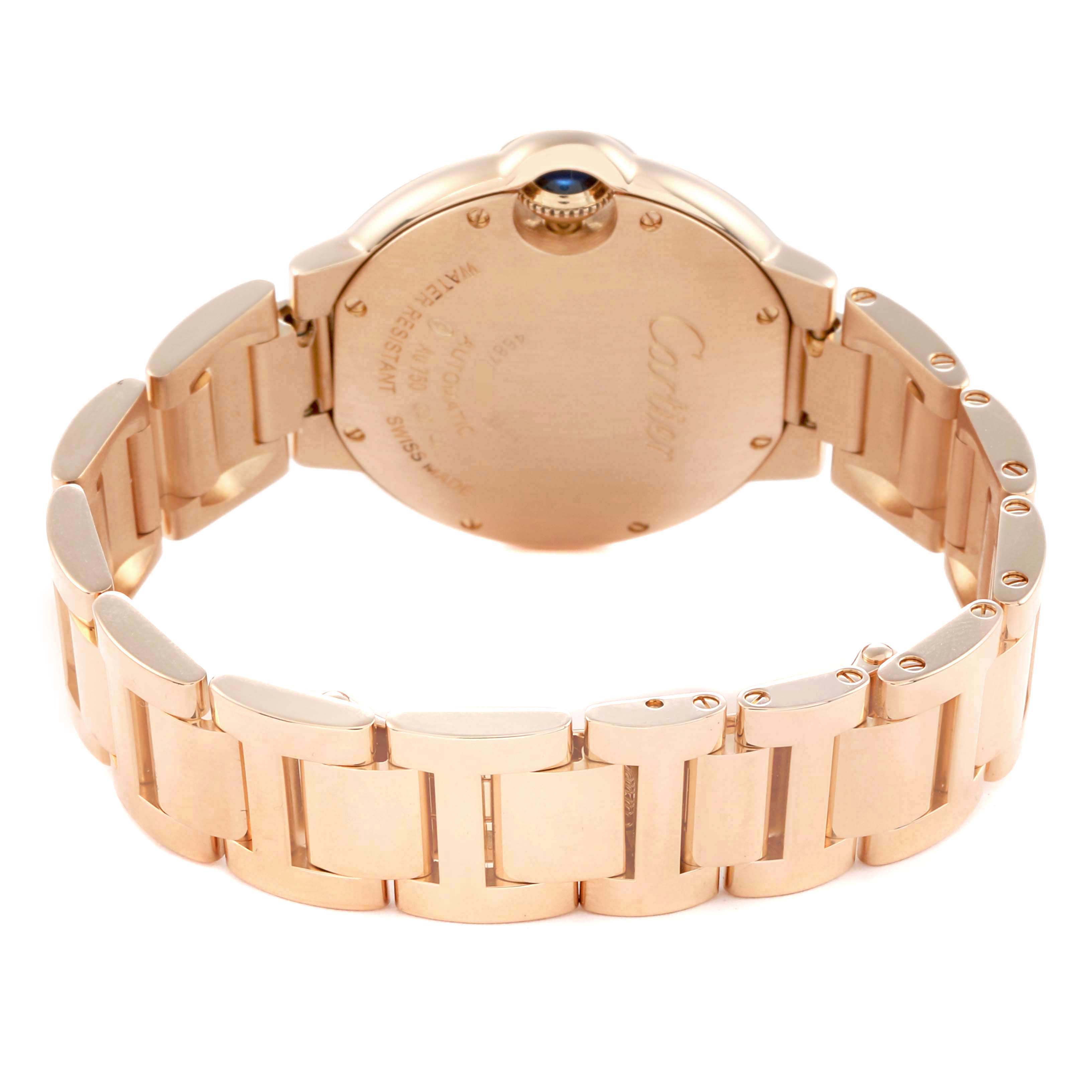 The image shows a rear view of a Cartier Ballon Bleu WE902034 Women's Rose Gold Silver Dial watch, featuring the back case and bracelet links.