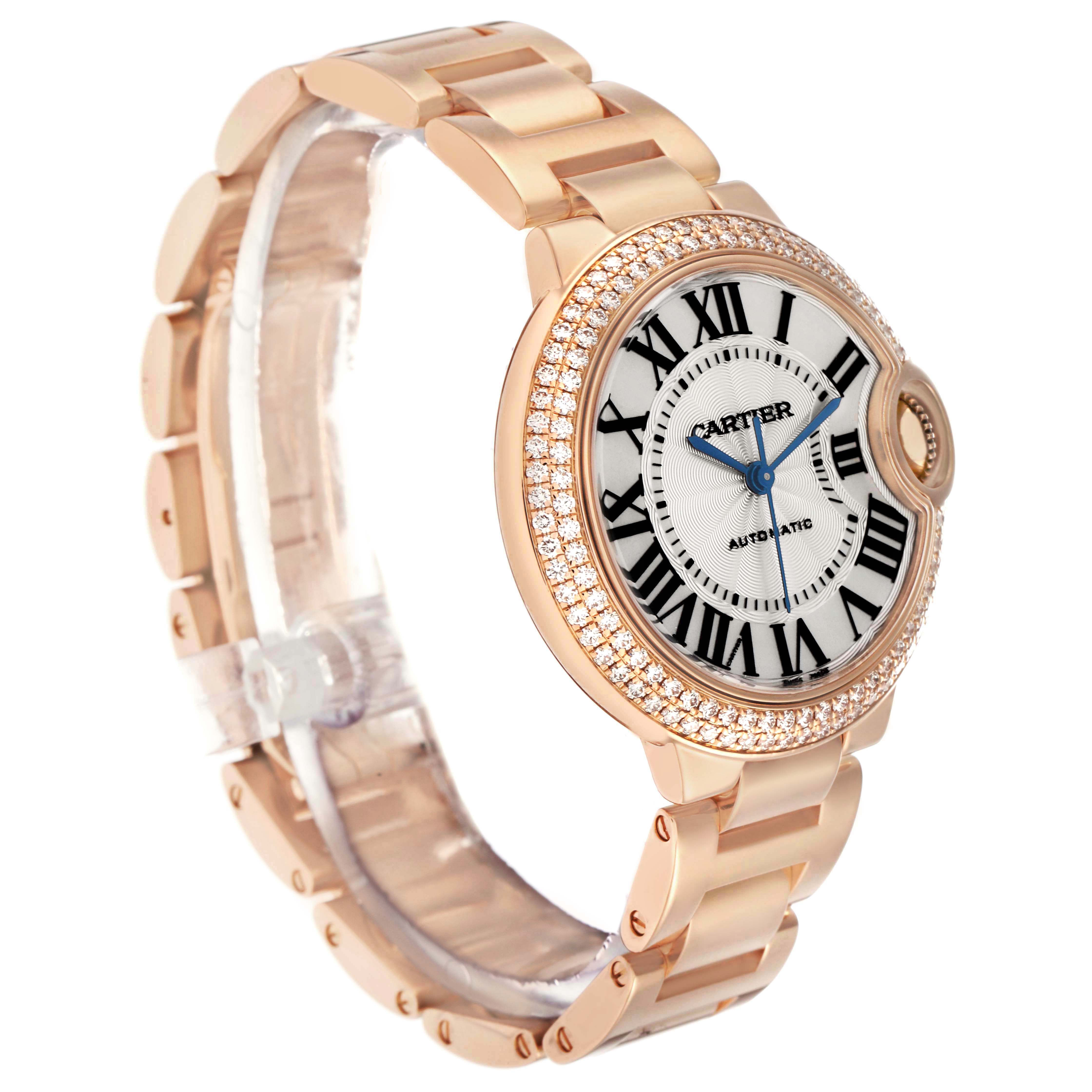 This image shows a Ballon Bleu de Cartier watch from a side angle, highlighting the dial, bracelet, and diamond-set bezel.
