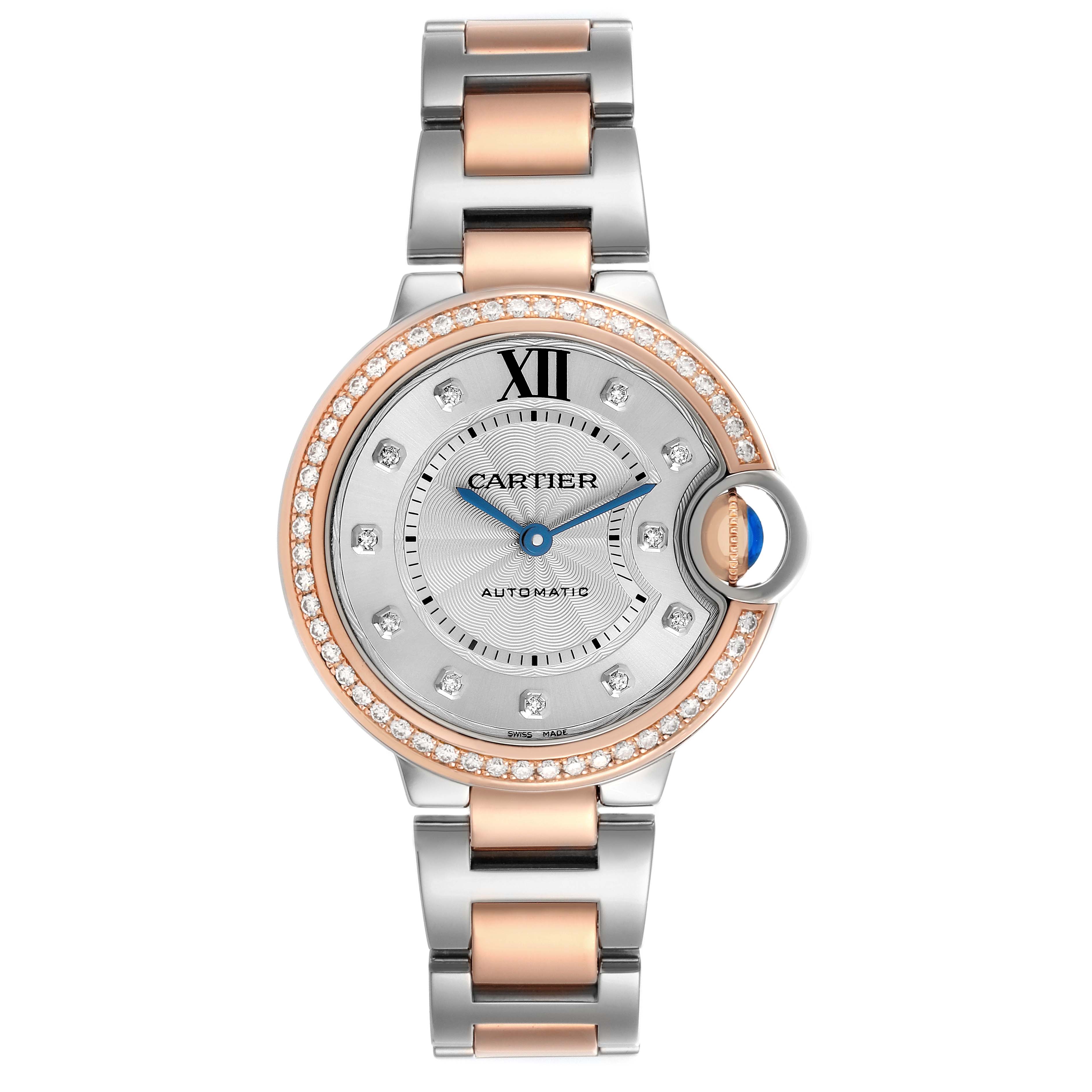 The image shows a Ballon Bleu de Cartier watch from a top-down angle, highlighting its dial, bracelet, and crown.