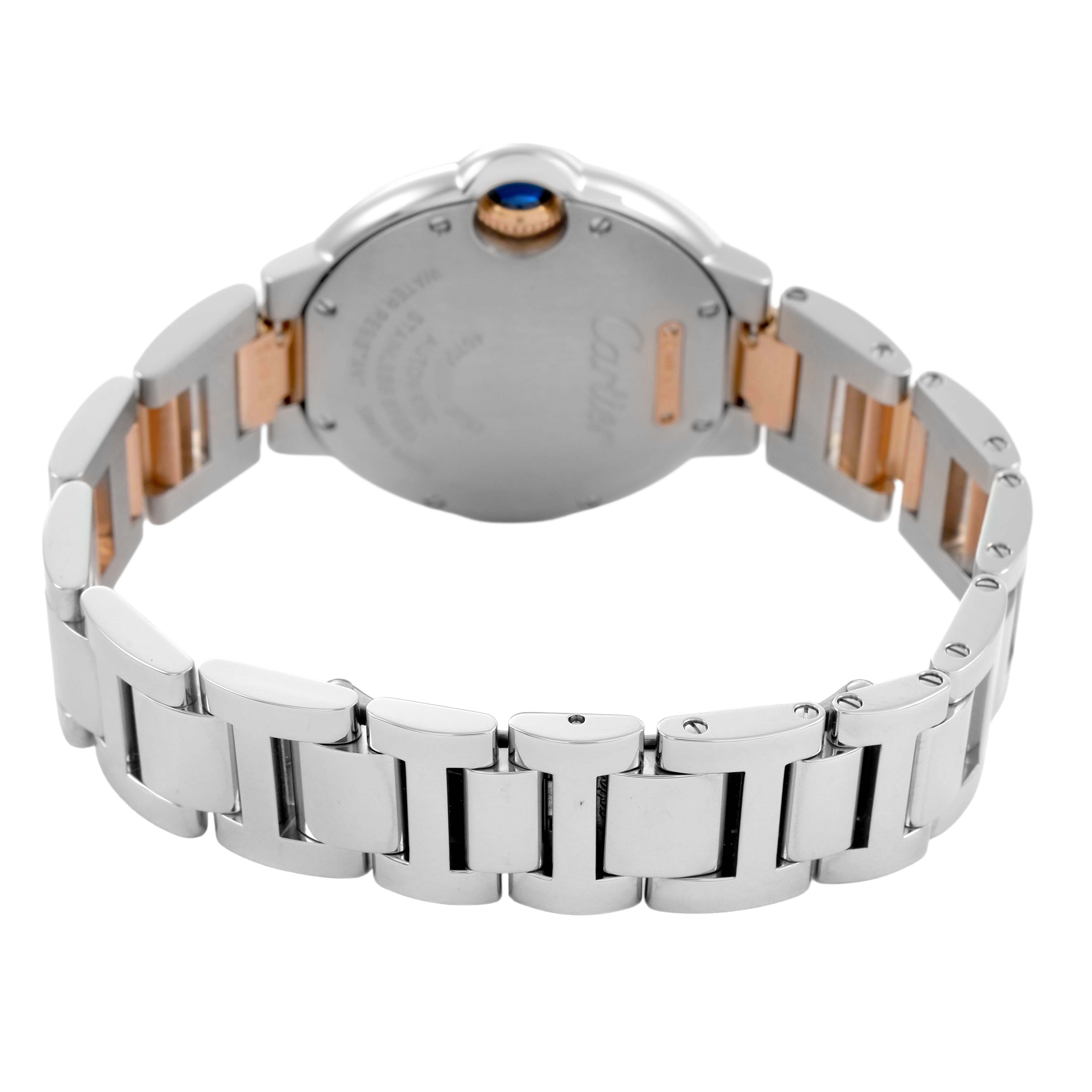 The image shows the rear view of a Cartier Ballon Bleu WE902077 Women's Steel and Gold (two tone) Silver Dial watch, highlighting the case back and metal bracelet.