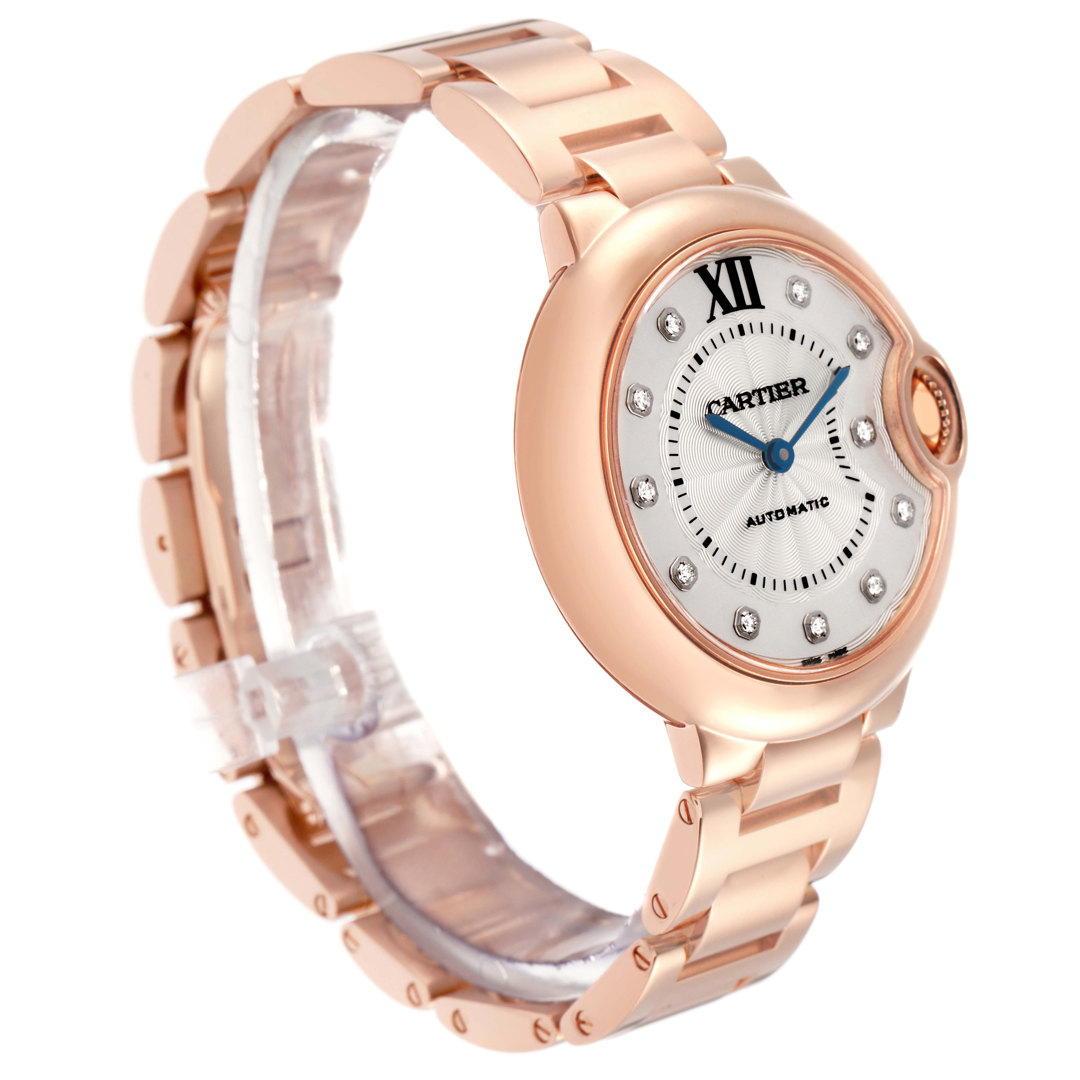 The image shows a Cartier Ballon Bleu model WE902039 from a side angle, highlighting its round case, bracelet, blue hands, and diamond indices.