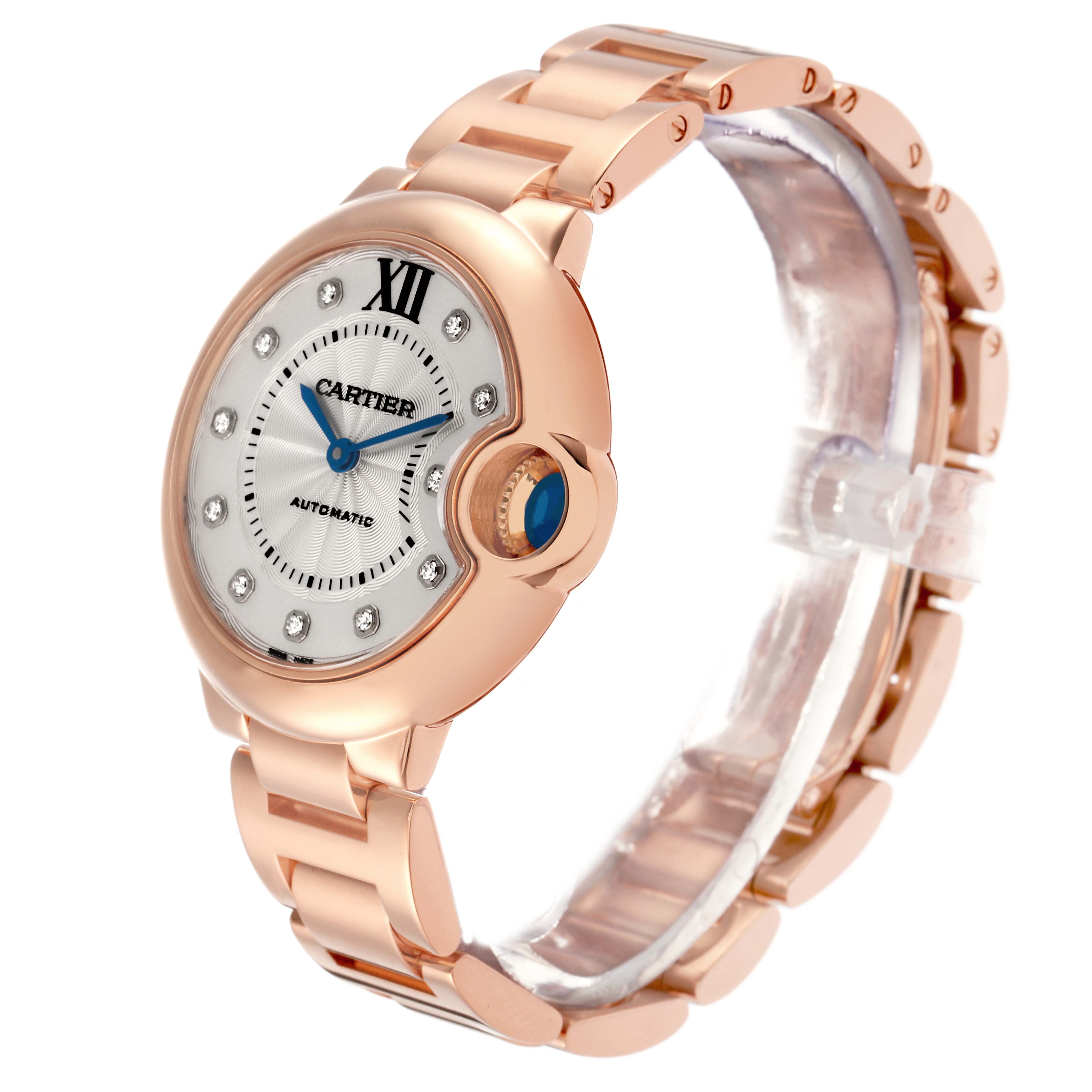 The Cartier Ballon Bleu WE902039 men's watch is shown at a slight angle, displaying its round face, metal bracelet, diamond markers, and prominent crown.