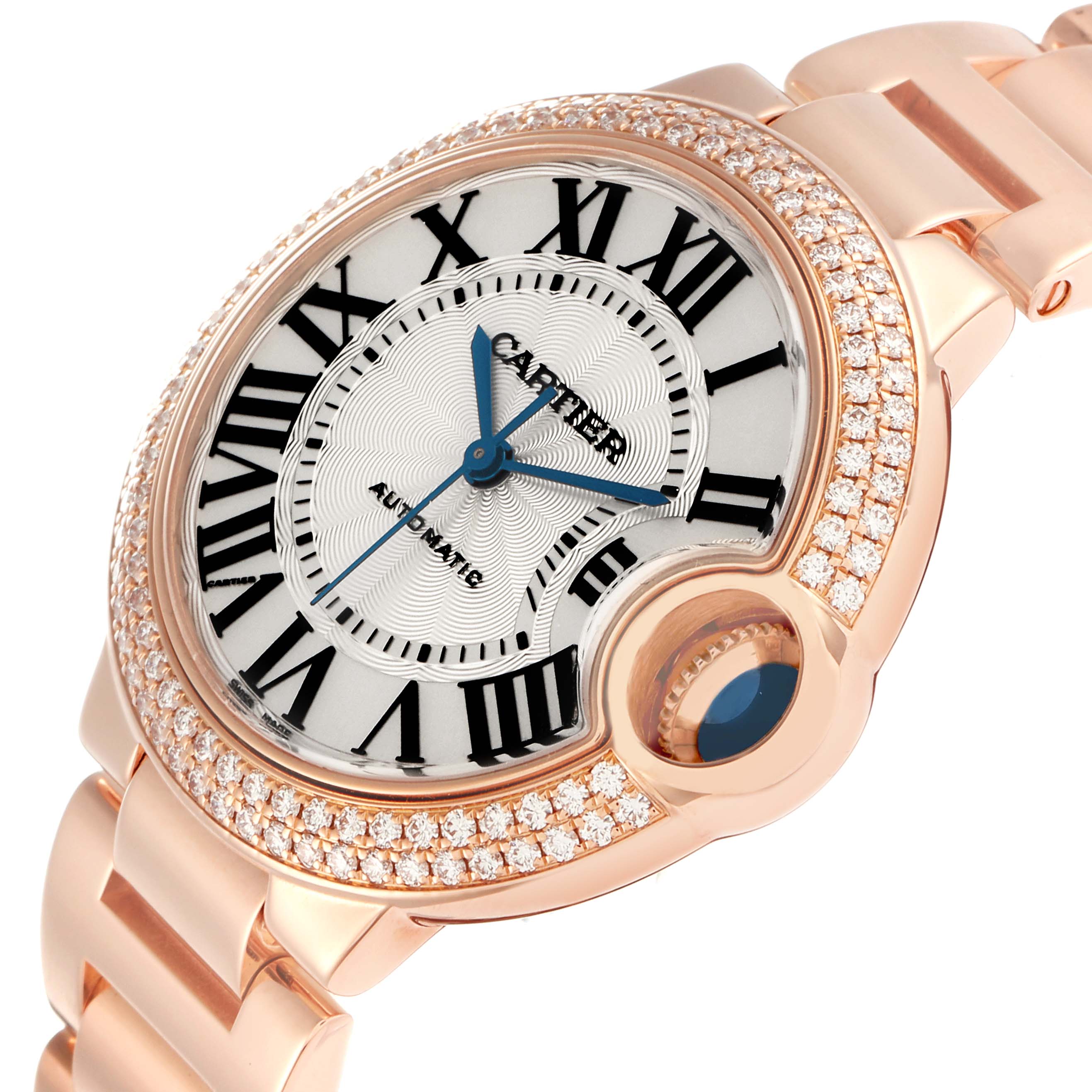 The Cartier Ballon Bleu model number WE902034 is shown at an angled view, highlighting the watch face, Roman numerals, blue hands, and diamond-set bezel.