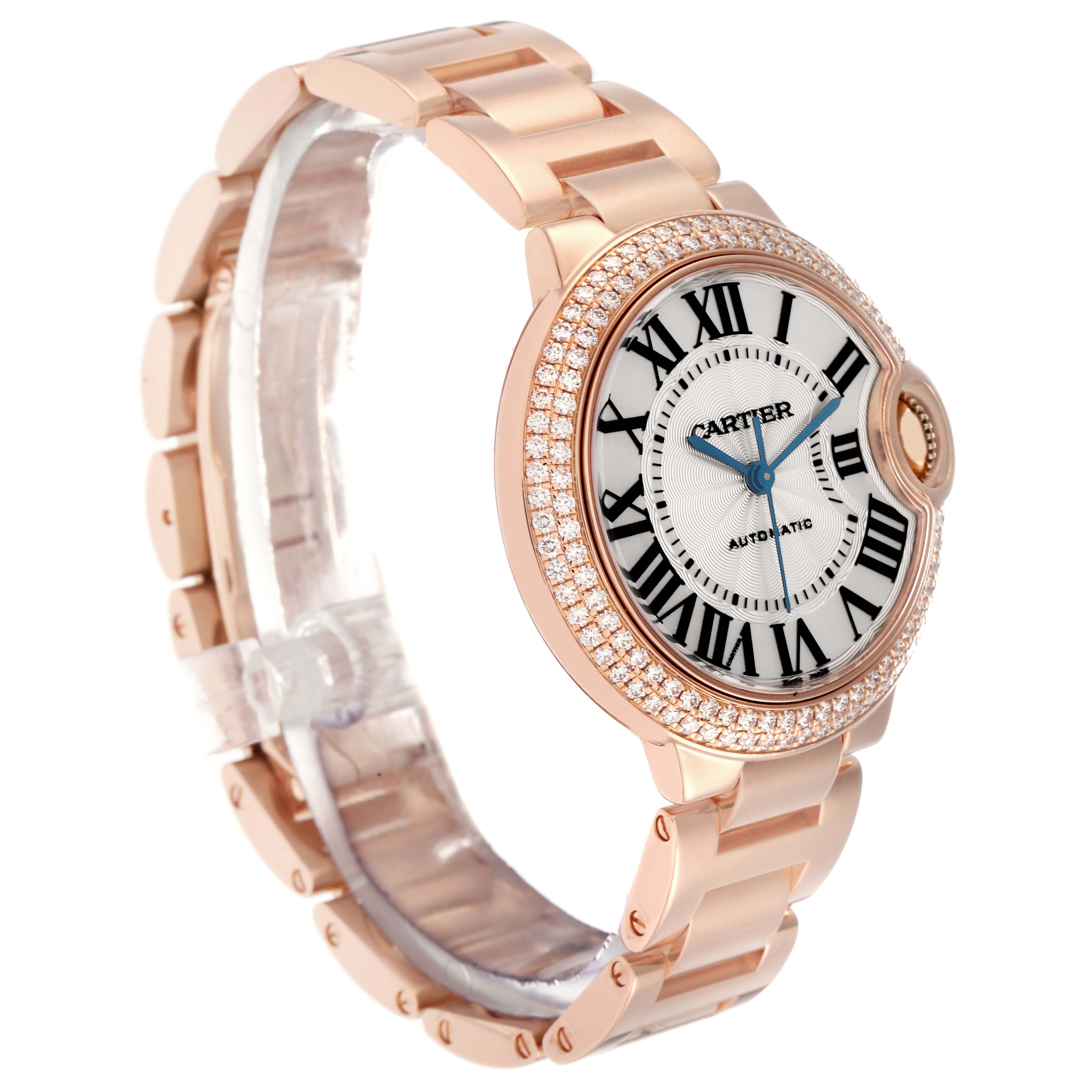 The Cartier Ballon Bleu model WE902034 is shown from a side angle, highlighting its round case, diamond bezel, Roman numerals, and metal bracelet.