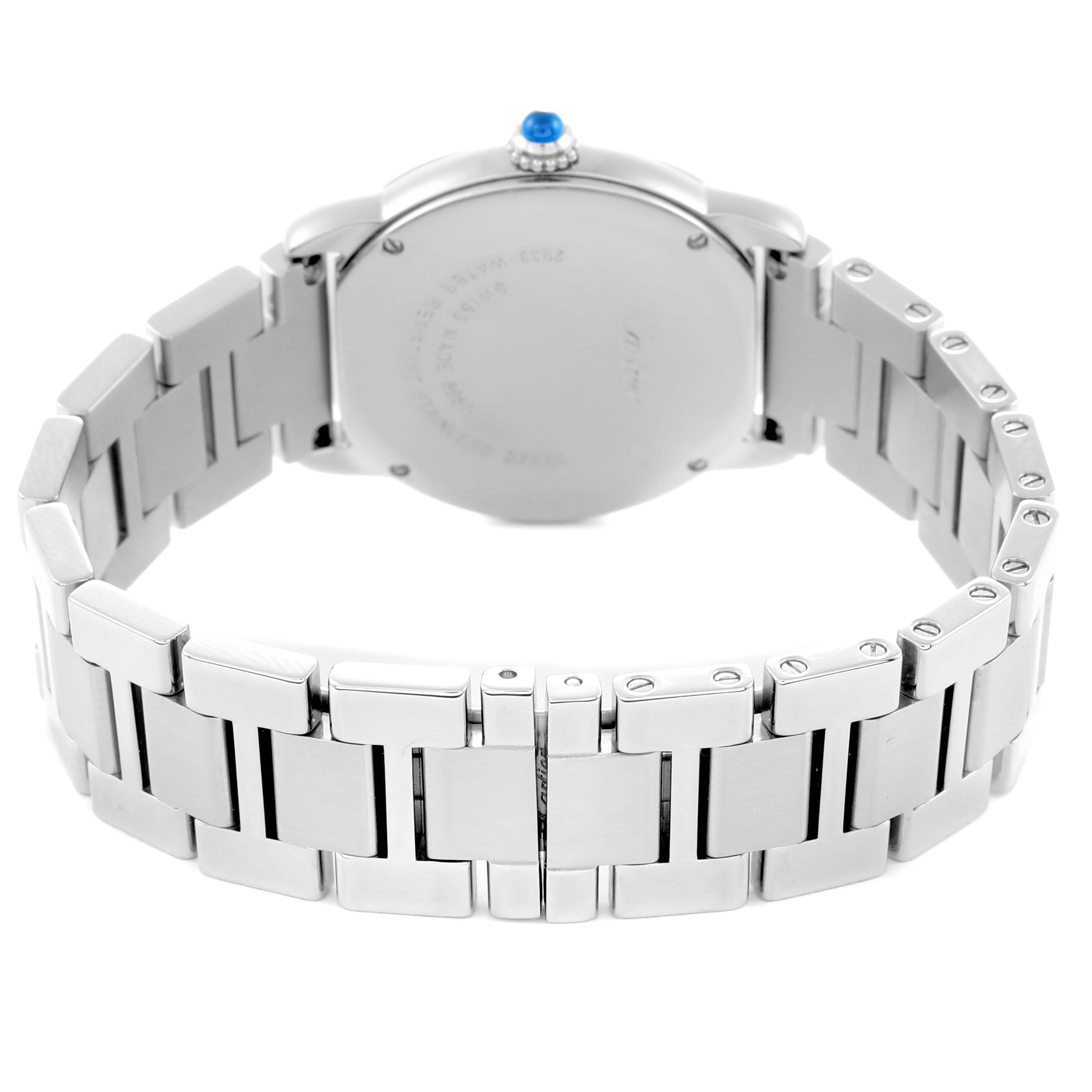 The Cartier Ronde model 72661 is shown from the back, highlighting the watch
s case, bracelet, and crown with a blue gemstone.