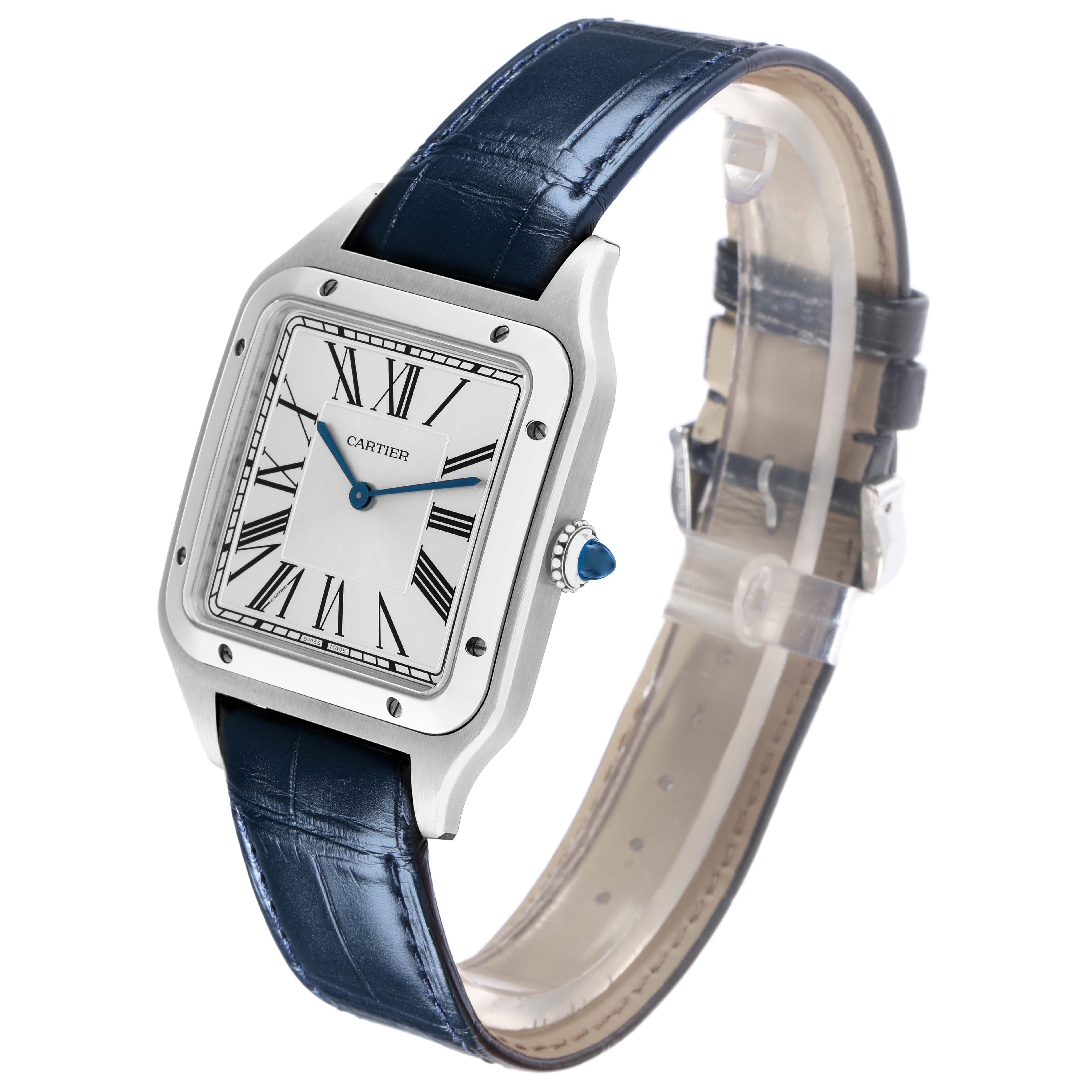 The Cartier Santos Dumont model WSSA0032 watch is shown at an oblique angle, highlighting the square case, Roman numeral dial, blue hands, crown, and blue leather strap.