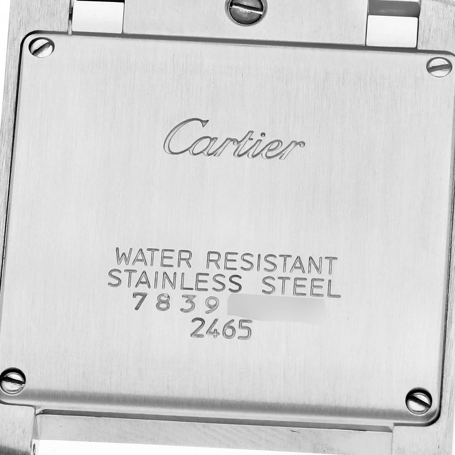 The image displays the case back of a Cartier Tank Française men
s watch, model W51011Q3, featuring engravings for water resistance and stainless steel.