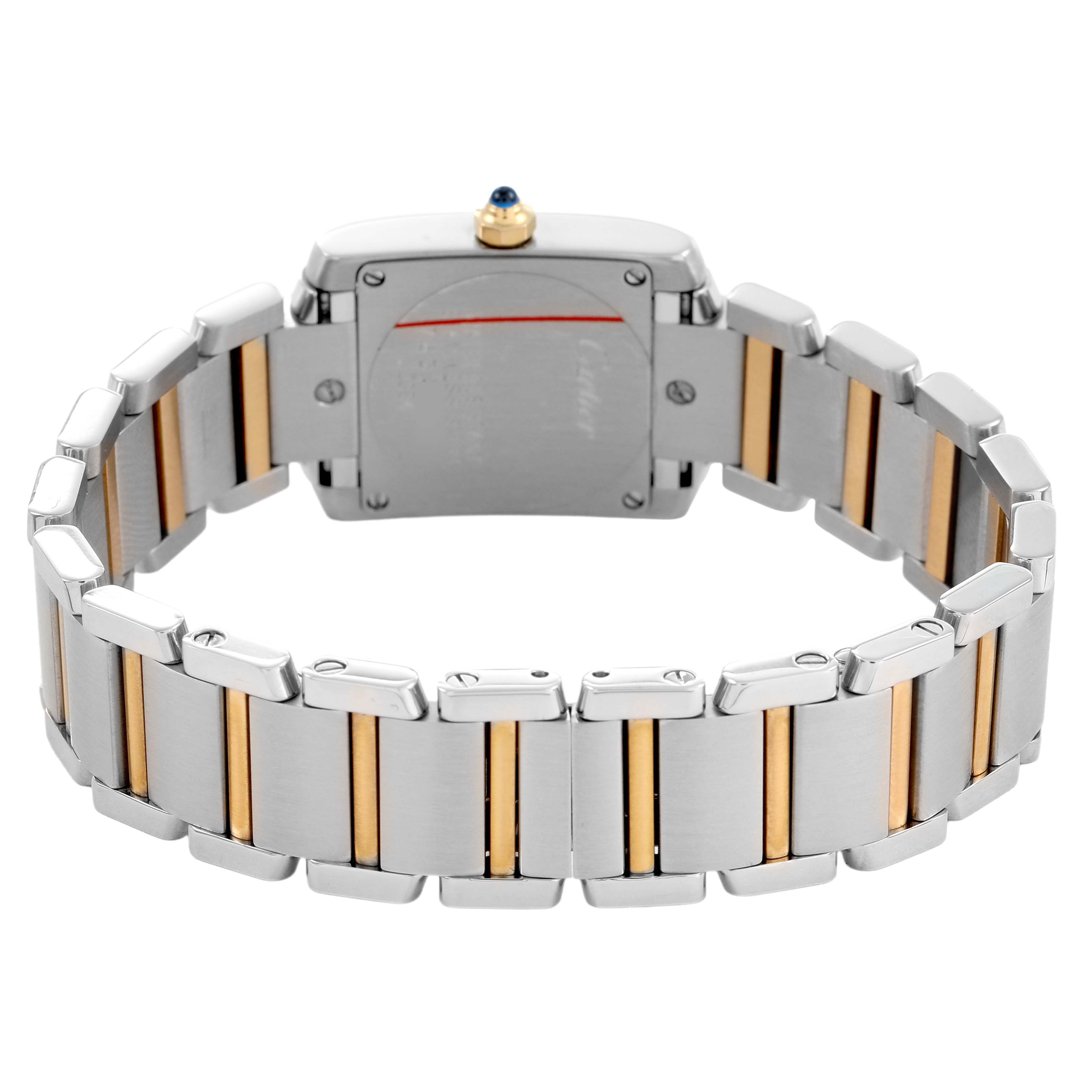 The image shows the back and part of the bracelet of the Cartier Tank Française watch, highlighting its two-tone metal links.