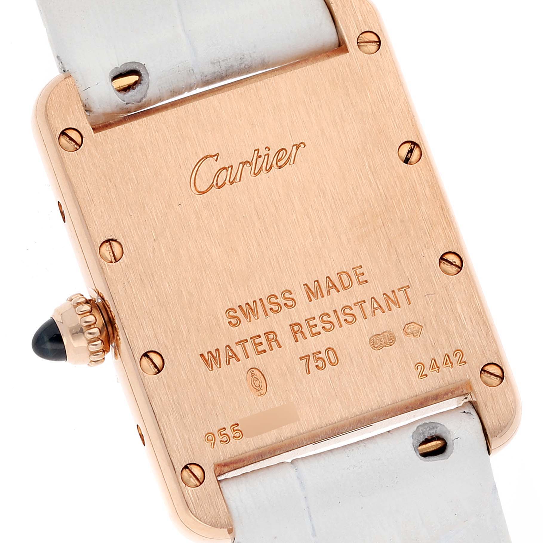 This image shows the case back and part of the strap of a Tank Louis model watch by Cartier, displaying engraved details.