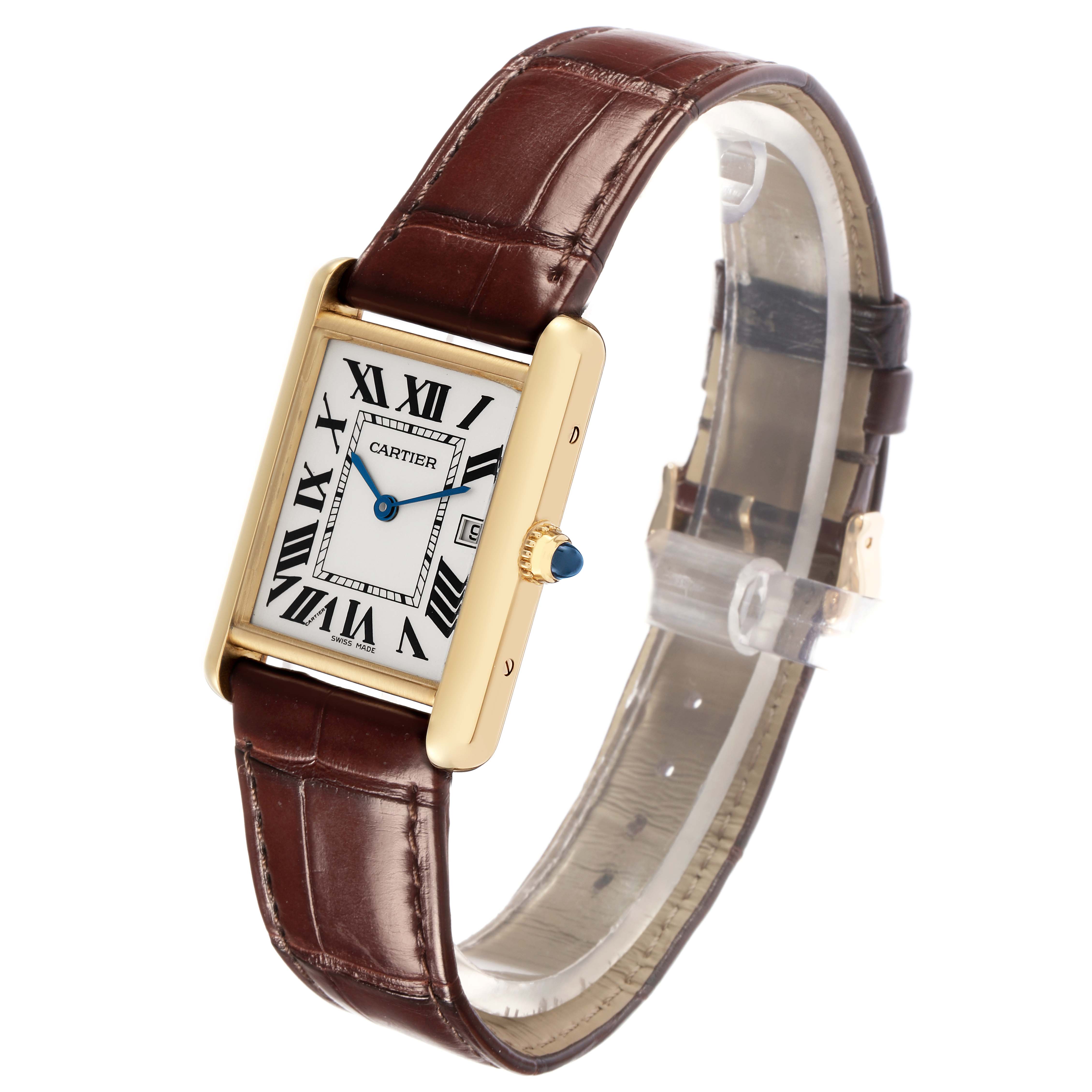 The Cartier Tank Louis model W1529756 is shown at a three-quarter angle, highlighting the gold case, Roman numeral dial, blue hands, and brown leather strap.