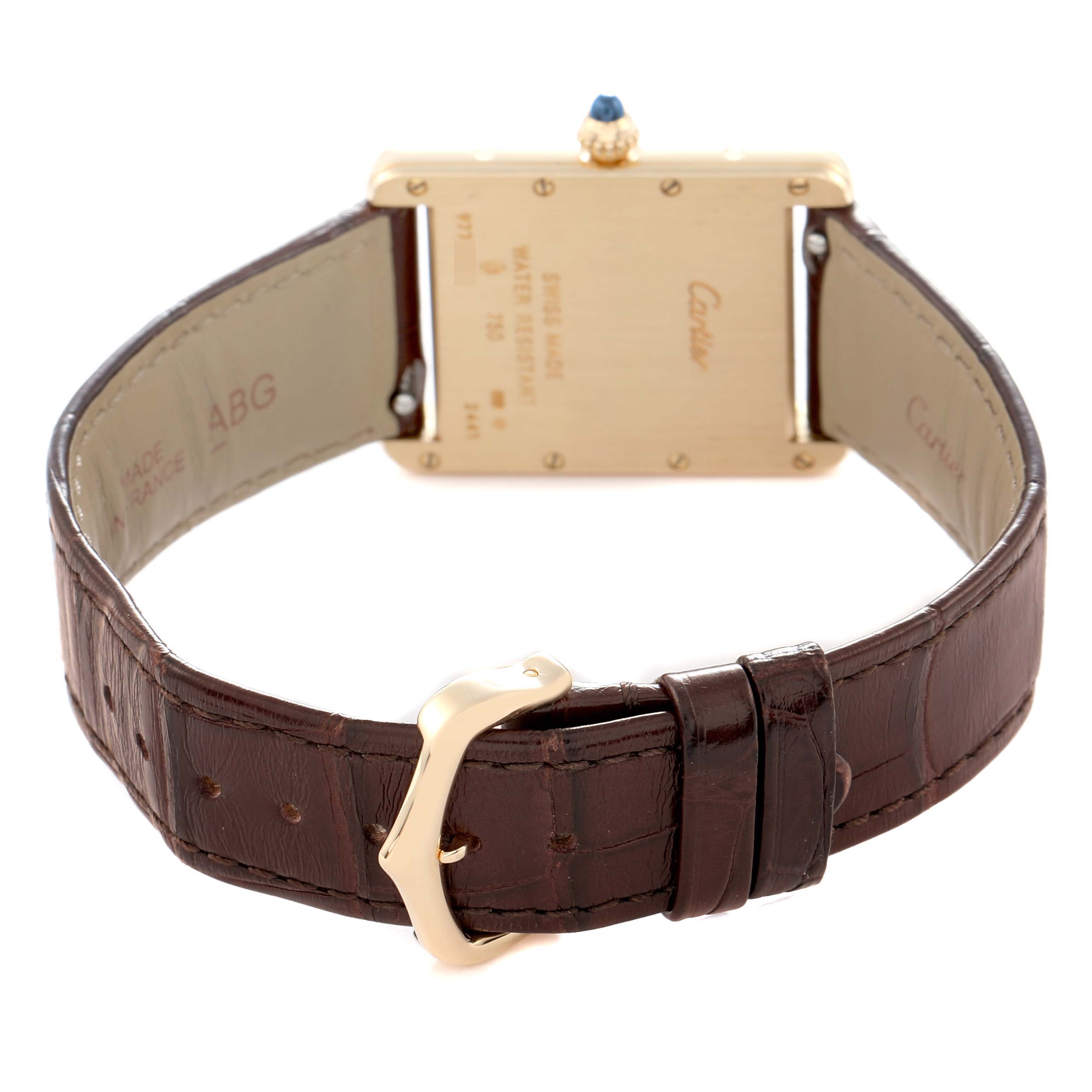 The image shows the back view of a Cartier Tank Louis watch, model W1529756, highlighting the caseback, leather strap, and buckle.