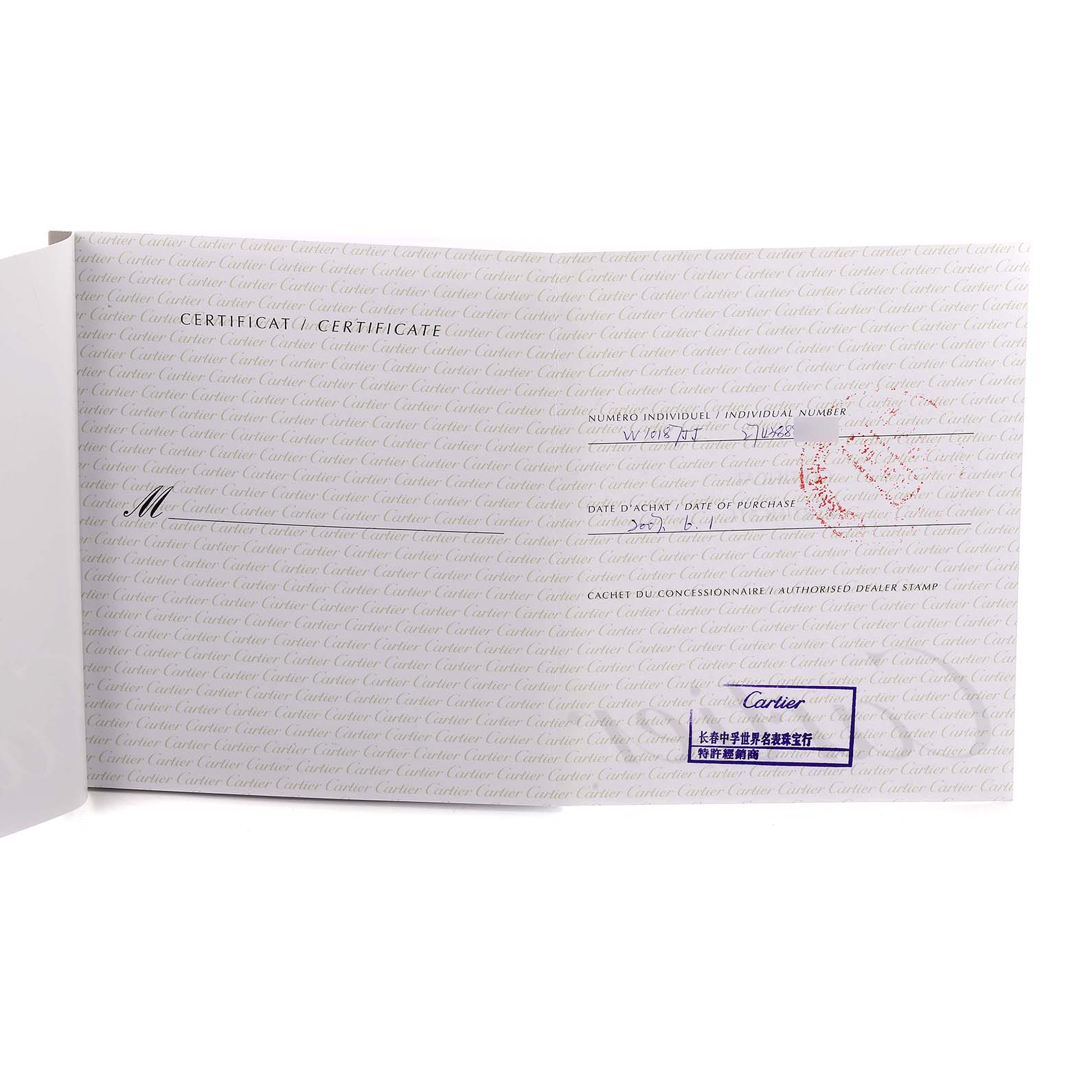 The image shows a certificate for the Cartier Tank Solo model, model number W1018755, with stamps and purchase information visible.