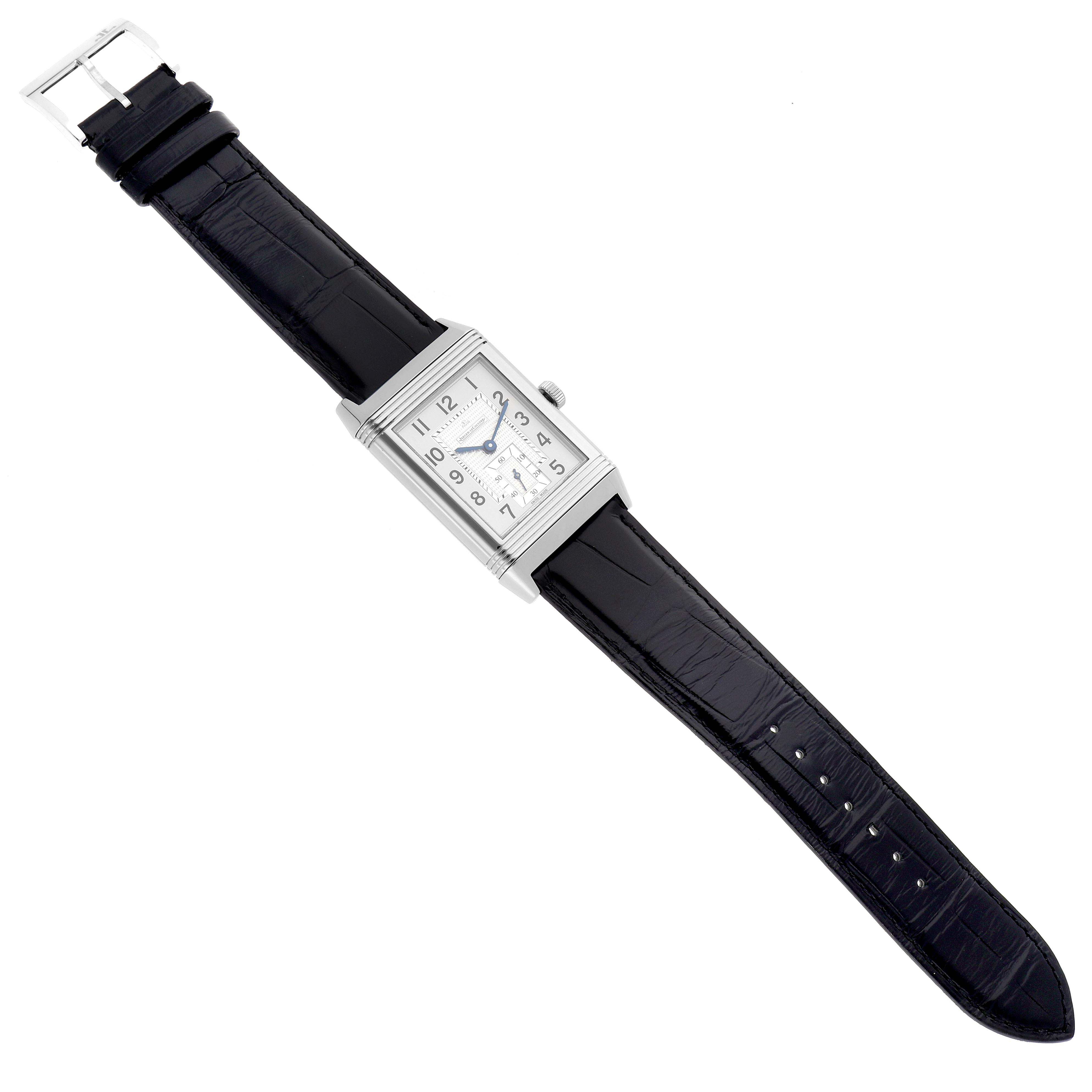 The Jaeger LeCoultre Reverso Q3738420 men's watch is shown from a top-down angle, displaying its rectangular face, case, and full leather strap.