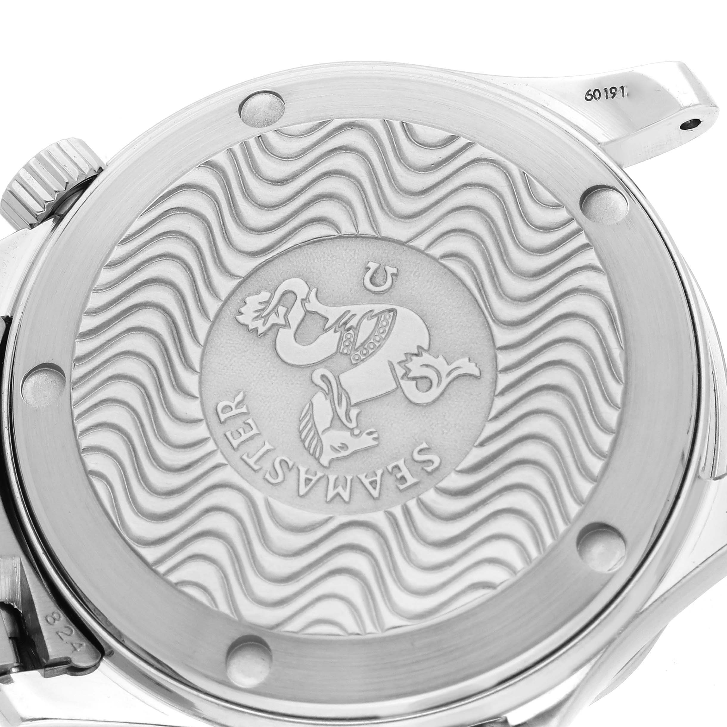 This image shows the intricately engraved case back of the Omega Seamaster 2551.80.00 Men
s Stainless Steel Blue Dial 2551.80.00 Men
s Stainless Steel Blue Dial watch taken from a close-up angle.