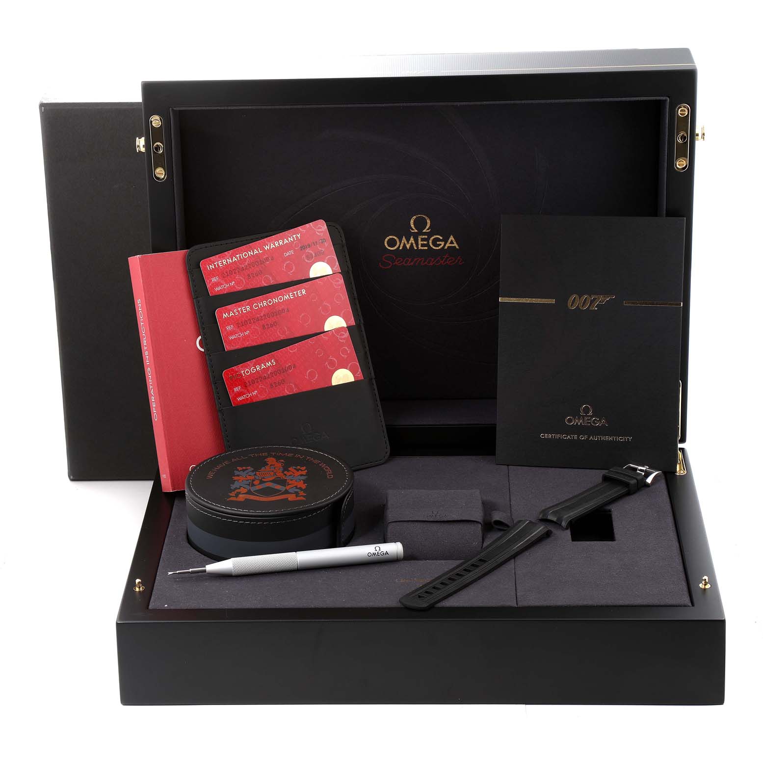 The image shows the Omega Seamaster 210.22.42.20.01.004 Men's Stainless Steel Black Dial 210.22.42.20.01.004 Men's Stainless Steel Black Dial watch box with accessories, cards, a tool, and an additional strap, displayed from a top angle.