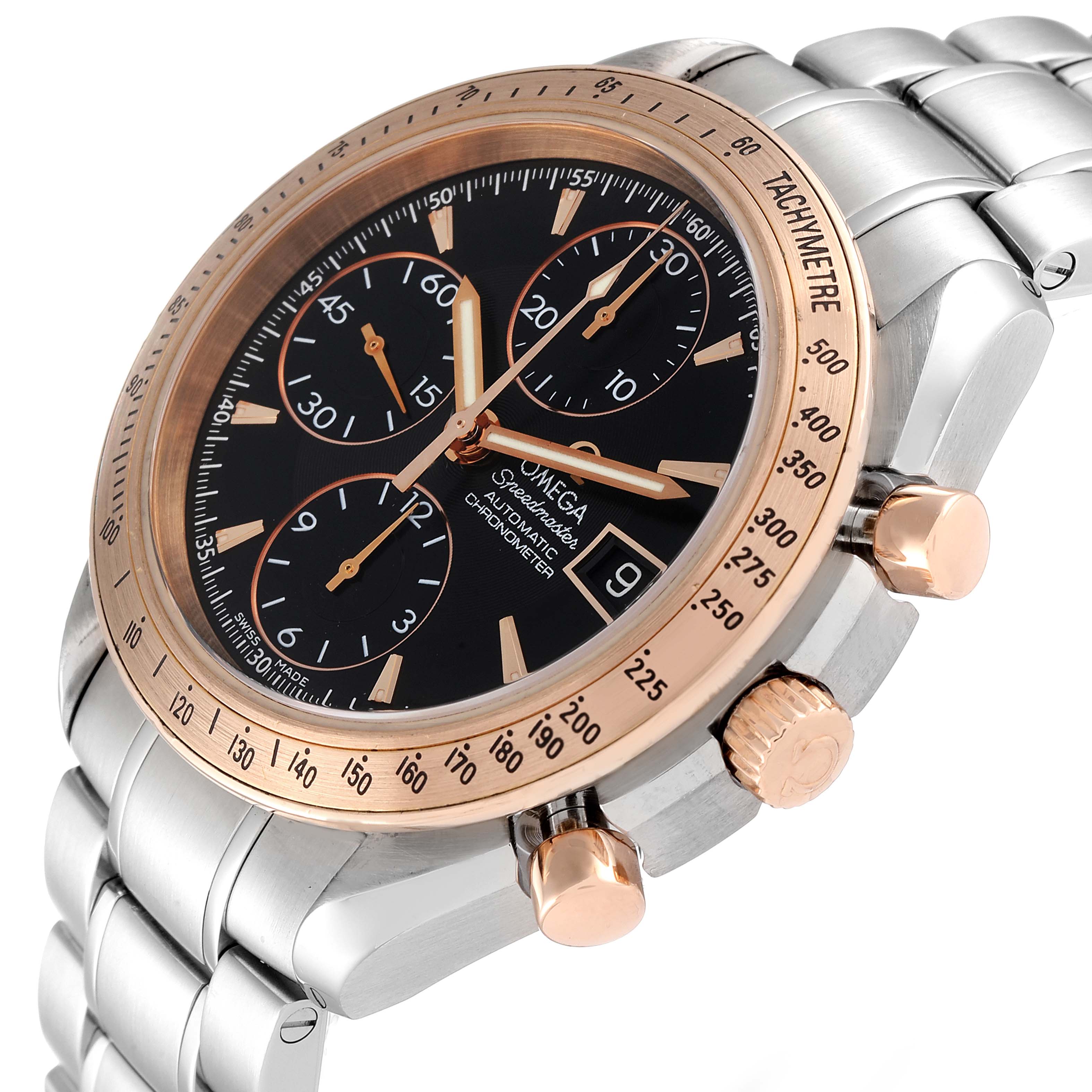 The image shows an Omega Speedmaster 323.21.40.40.01.001 Men's Steel and Gold (two tone) Black Dial 323.21.40.40.01.001 Men's Steel and Gold (two tone) Black Dial watch at an oblique angle, highlighting the dial, bezel, and chronograph pushers.