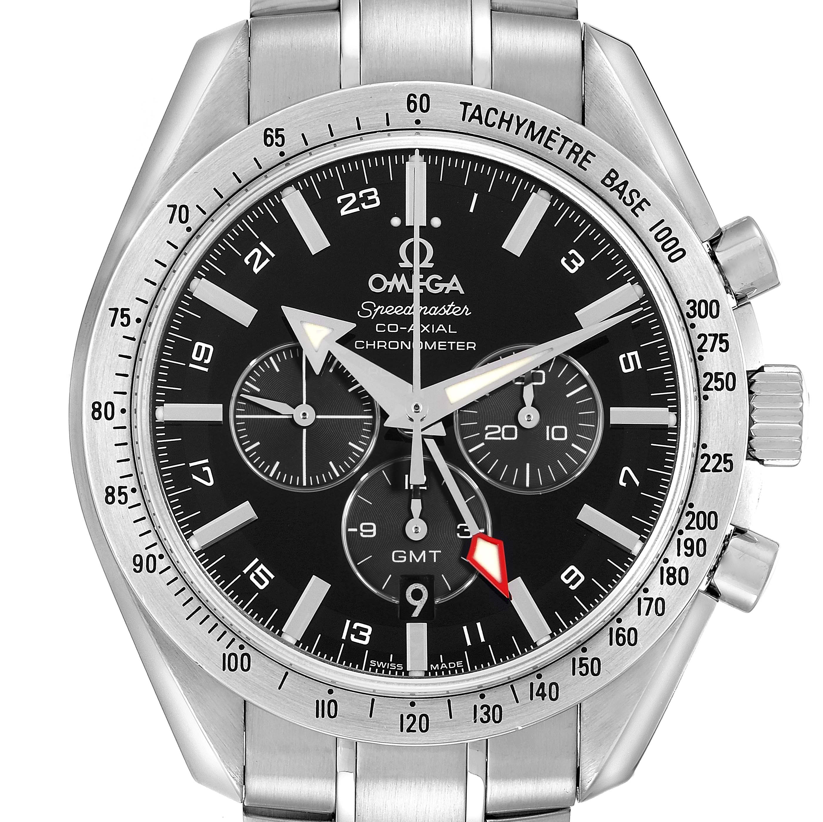 The Omega Speedmaster model 3581.50.00 is shown from a front angle, highlighting its black dial, chronograph subdials, tachymeter bezel, and stainless steel bracelet.