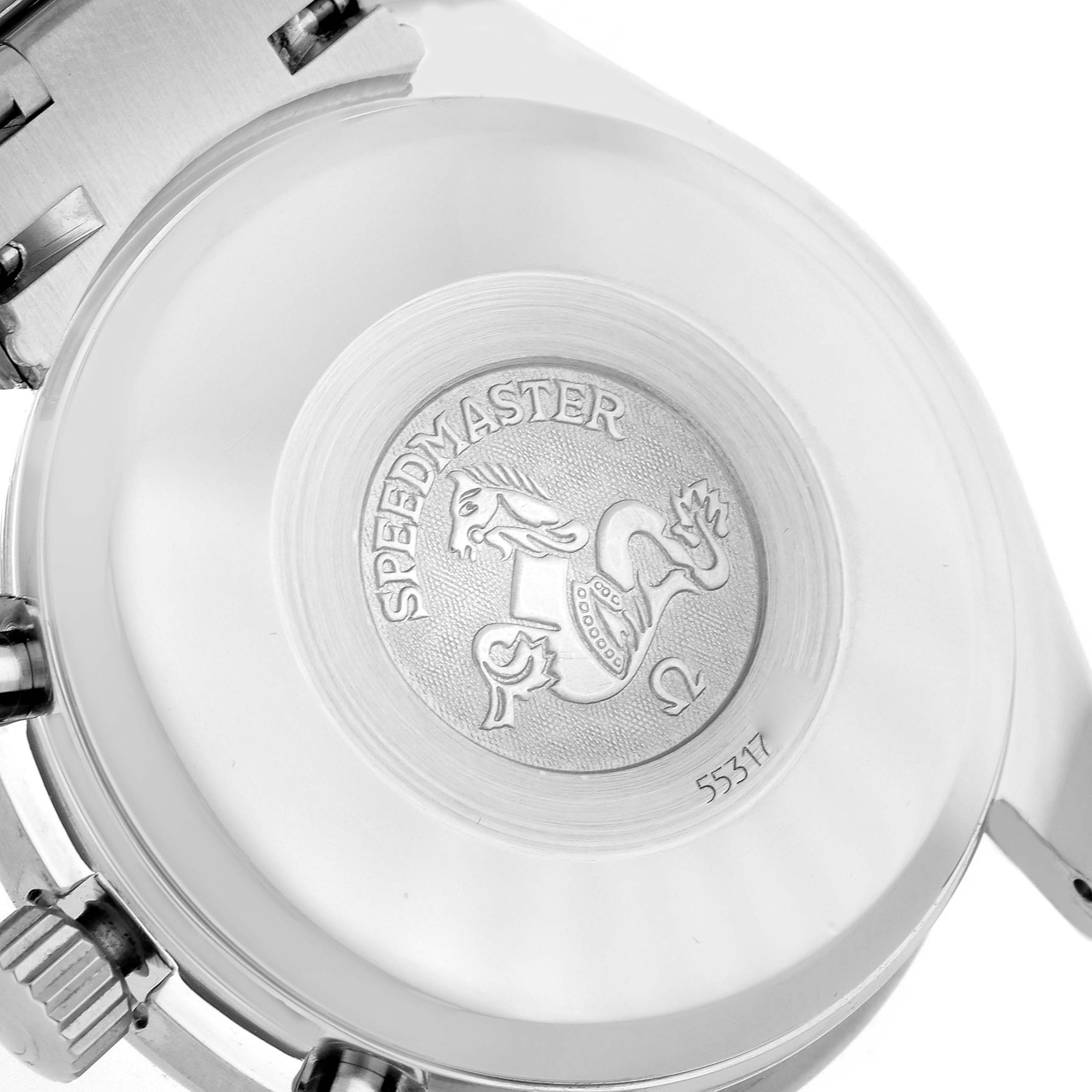 The image shows the back case of the Omega Speedmaster model 3520.53.00, displaying its engraved design and partial view of its bracelet and lugs.