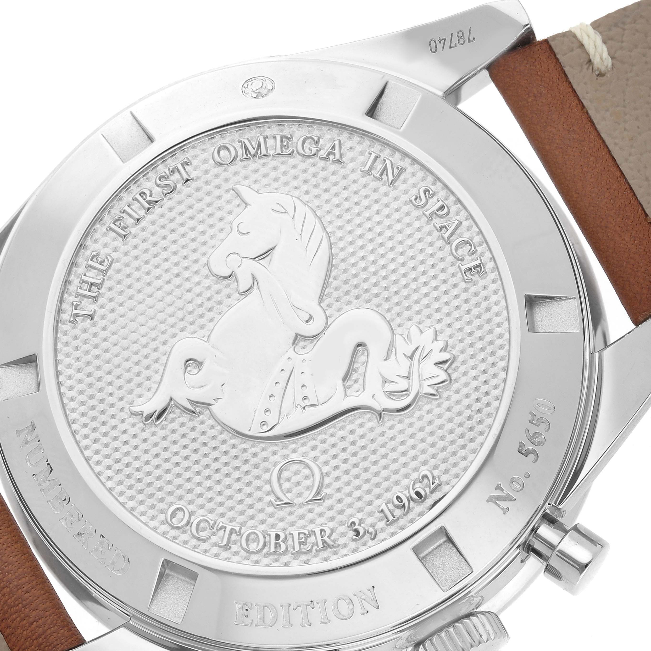 The image shows the back case of the Omega Speedmaster model 311.32.40.30.01.001, highlighting the embossed design and text, with part of the strap visible.