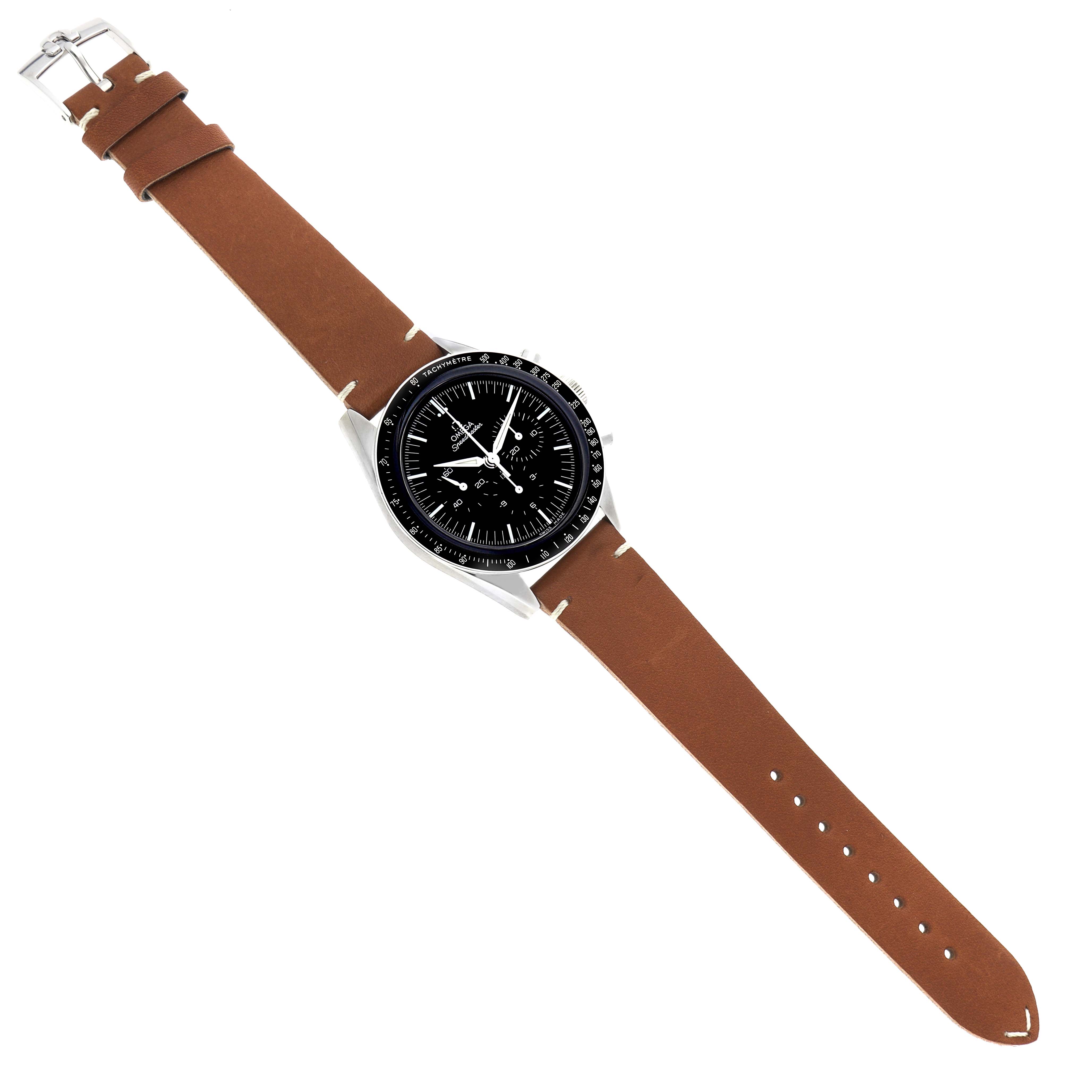 The Omega Speedmaster model 311.32.40.30.01.001 is shown at a top-down angle, featuring a brown leather strap, black dial, and tachymeter bezel.