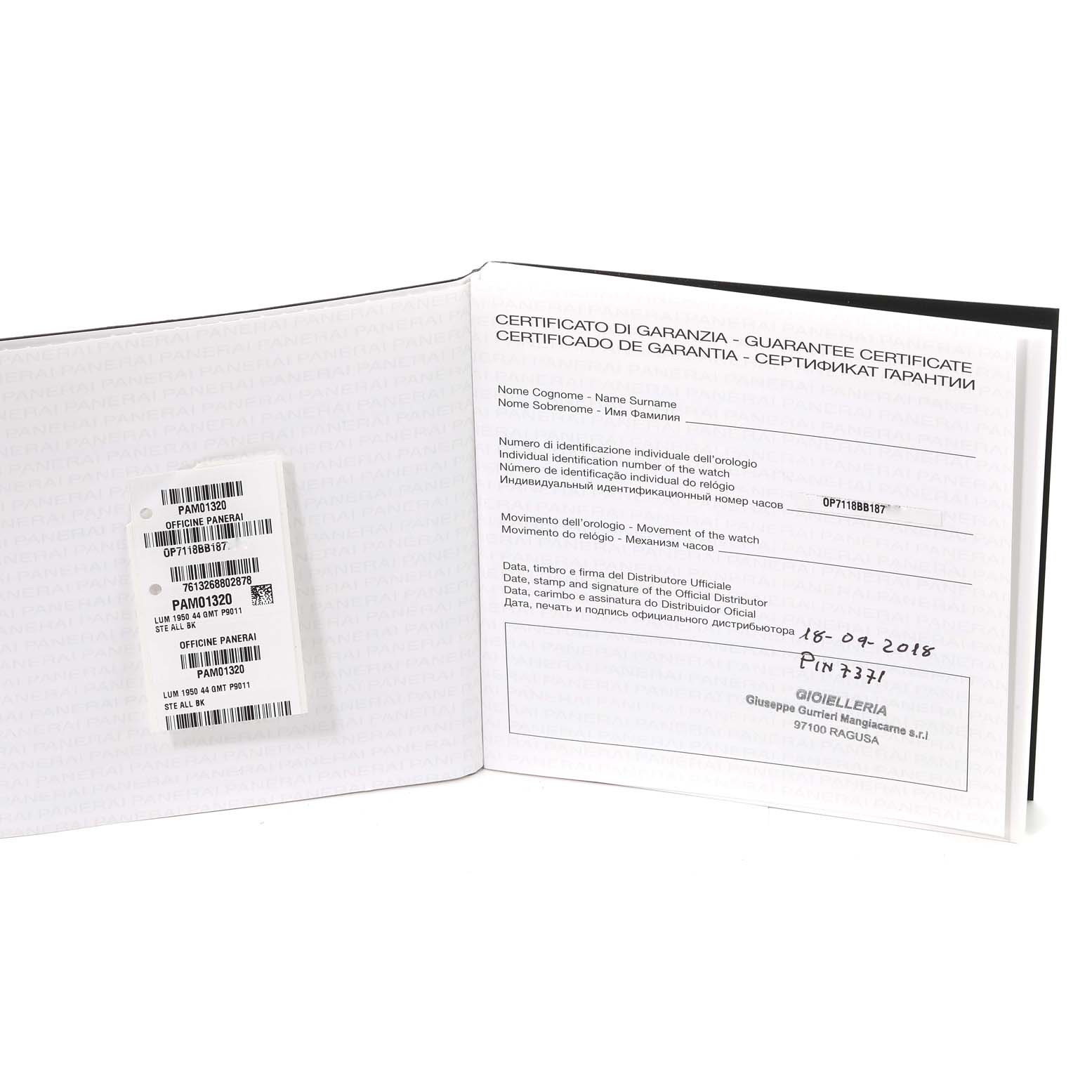 The image shows the guarantee certificate booklet for a Panerai Luminor PAM01320 Men's Stainless Steel Blue Dial PAM01320 Men's Stainless Steel Blue Dial model watch, opened to reveal the barcode and warranty information.