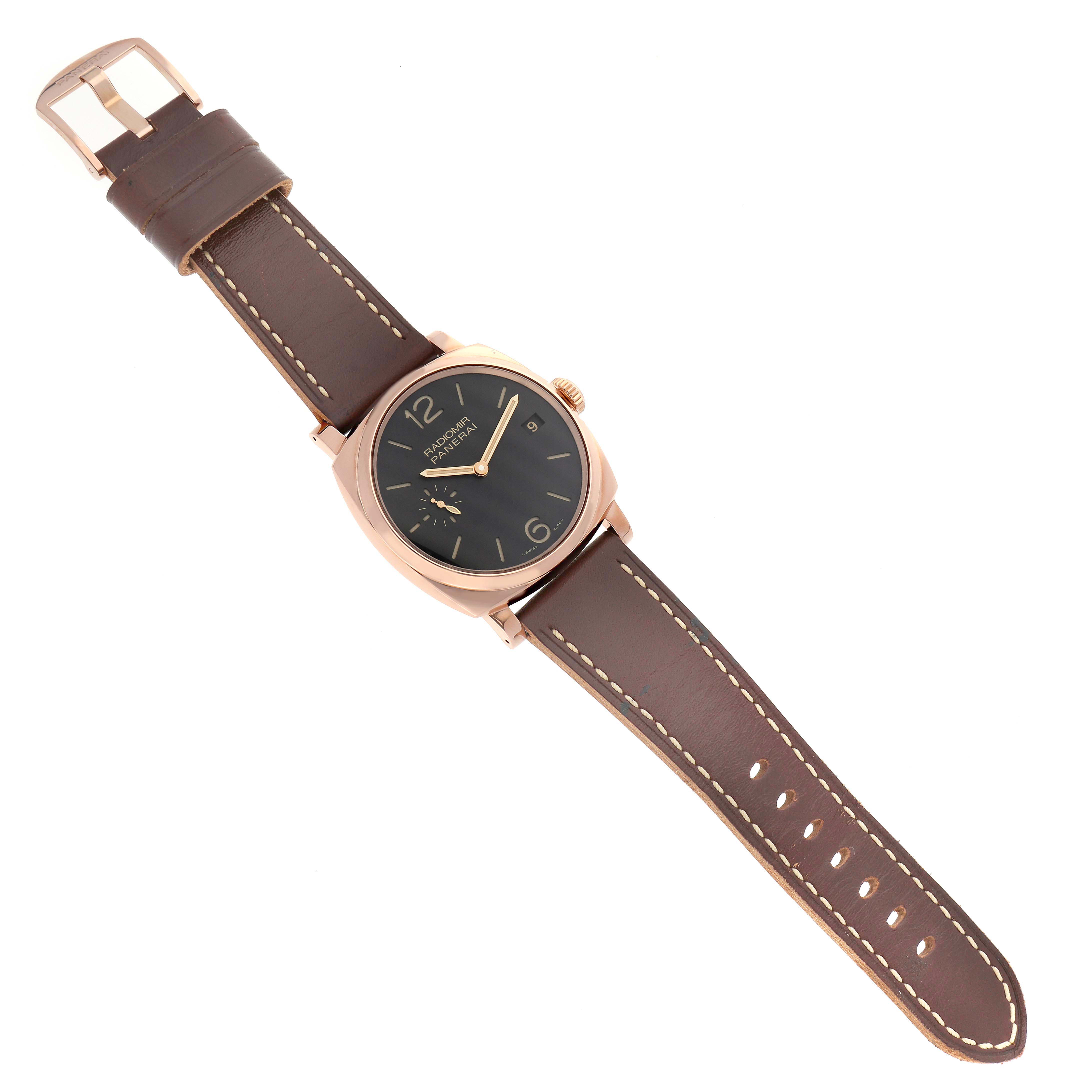 The Panerai Radiomir PAM00515 Men's Rose Gold Brown Dial watch is shown from an overhead angle, displaying its case, dial, crown, and brown leather strap.