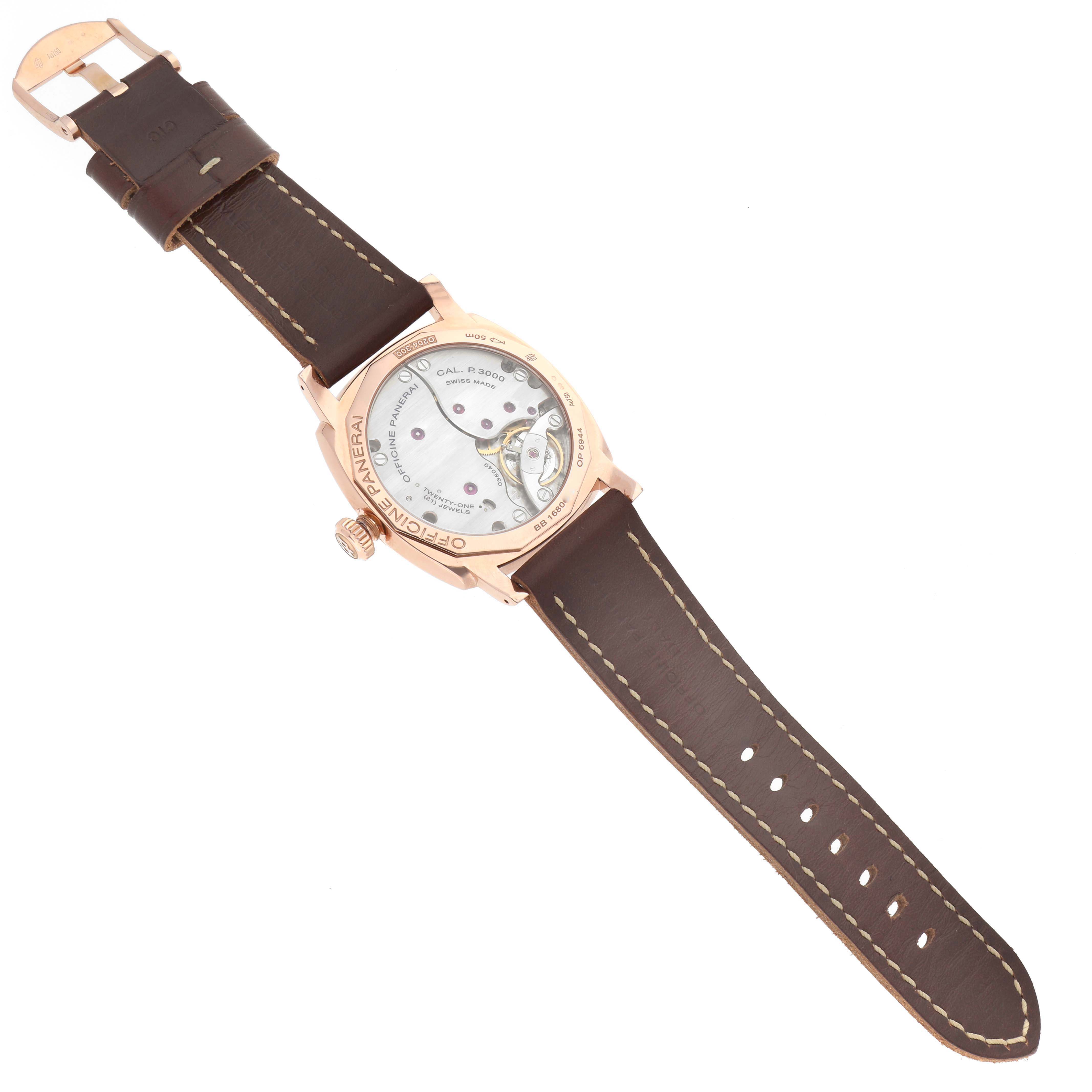 The Panerai Radiomir PAM00515 Men's Rose Gold Brown Dial watch is shown from the back, displaying its open case back and brown leather strap.